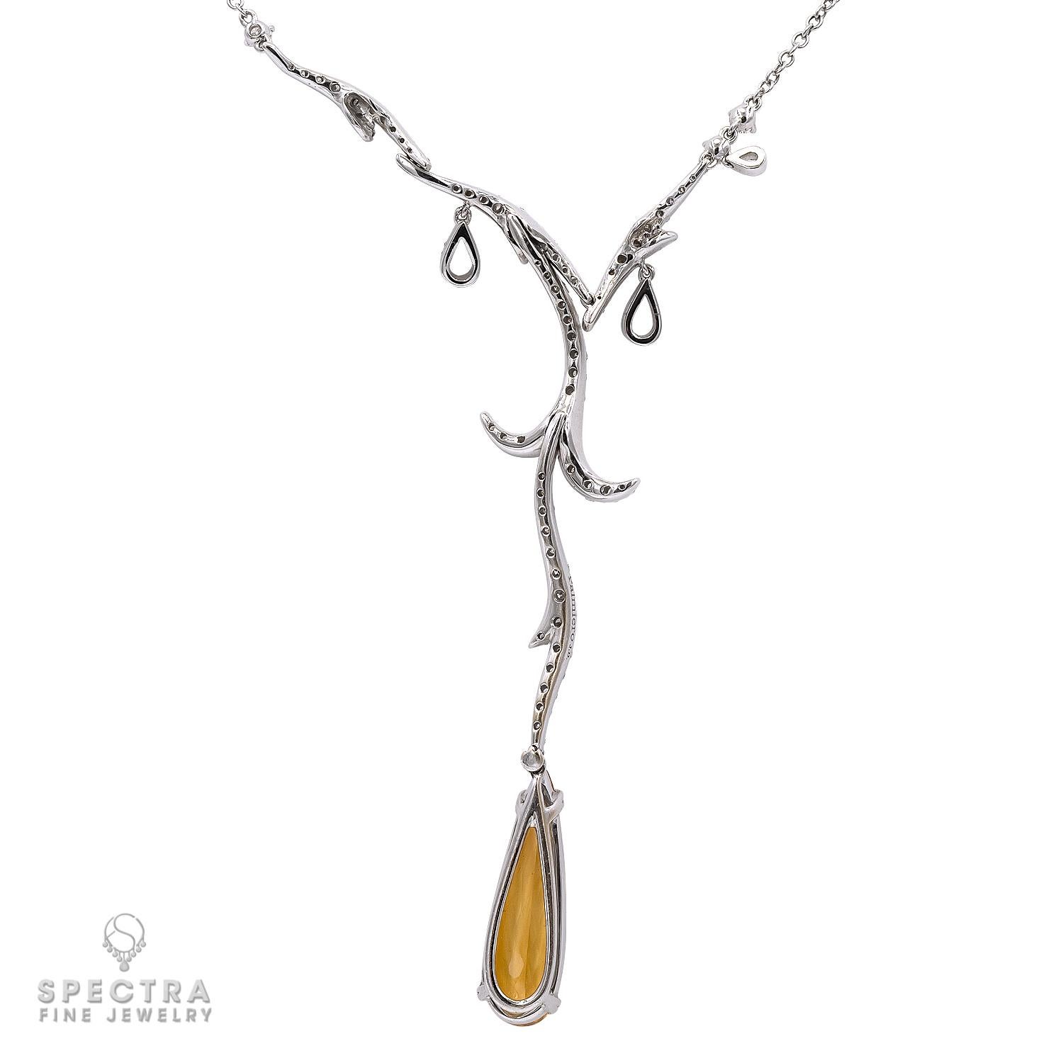 The unique look of drizzled diamonds glitters delicately in this artful Palmiero Diamond Yellow Topaz Lavalier Necklace, made in Italy in the 21st century. The jewel is magnificently crafted in 18K white gold and embellished with diamonds