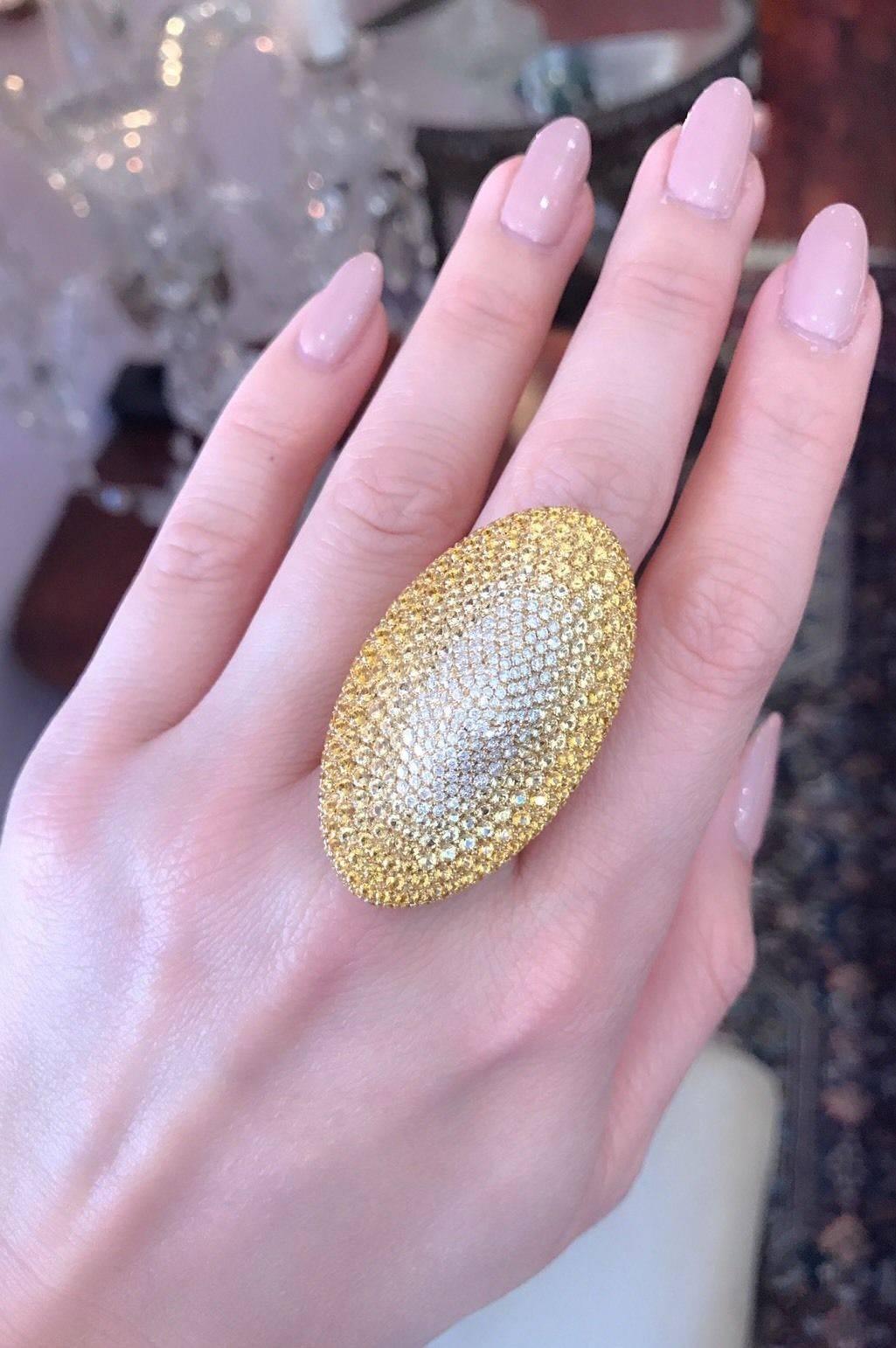 Oval shaped pave cocktail ring by Palmiero featuring 
A beautiful gradient color of yellow sapphires that gradually blend into white diamonds in the center. 
7.18 carats of Yellow Sapphire and 1.24 carats of white diamonds for a total of  8.42