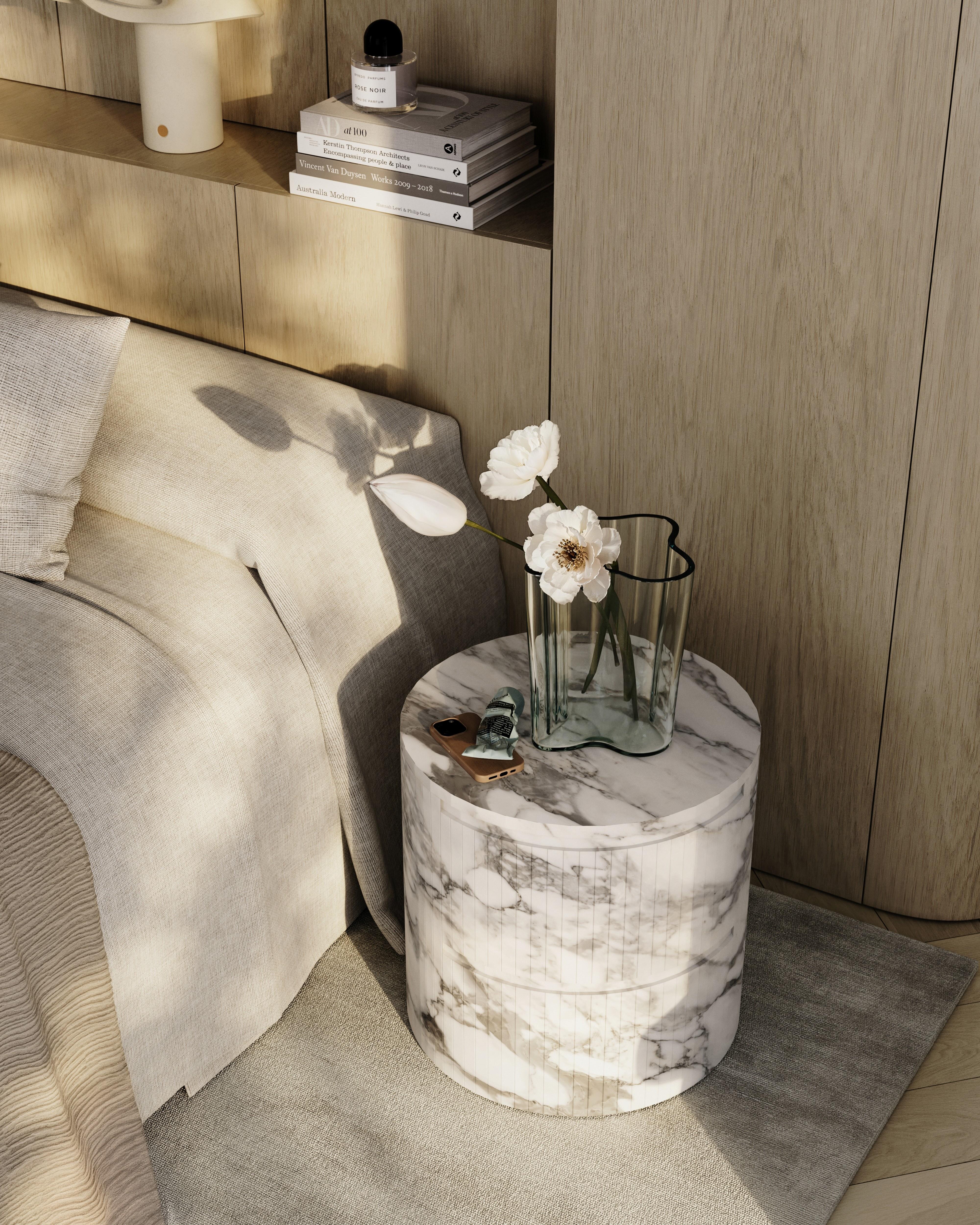 The Ashley Bedside Table by Paloma is hand crafted in Italy by master artisans. Two hidden drawers enshrined within Paloma’s signature directional line work glide open to reveal a finely-oiled oak interior with discreet compartments for personal