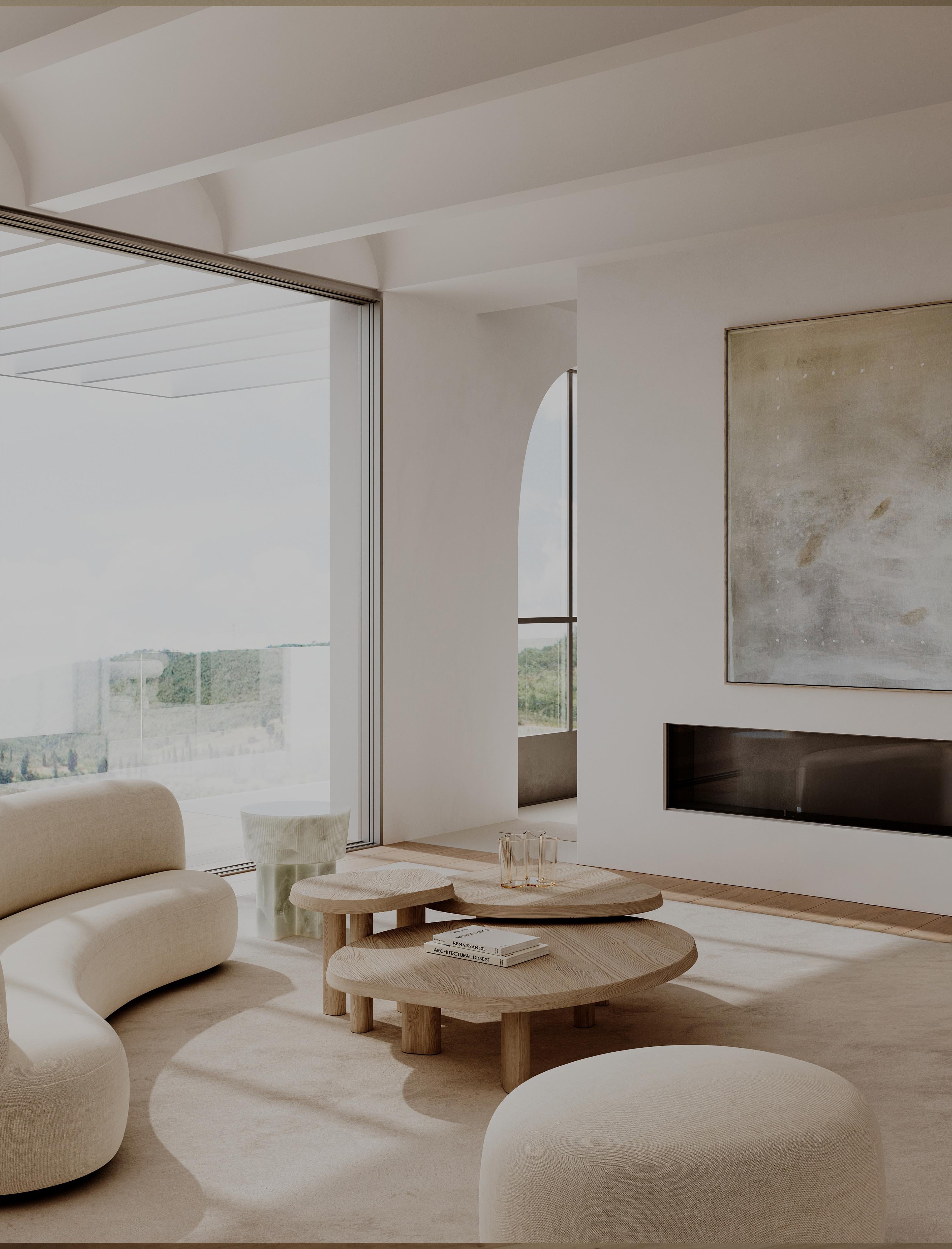 La Mesa de centro Constantin de Paloma Editions está esculpida en materiales nobles, y sus contornos sutilmente orgánicos recuerdan la costa de arena blanca de Australia. Los tres elementos entrelazados pueden anidarse como uno solo o disponerse por