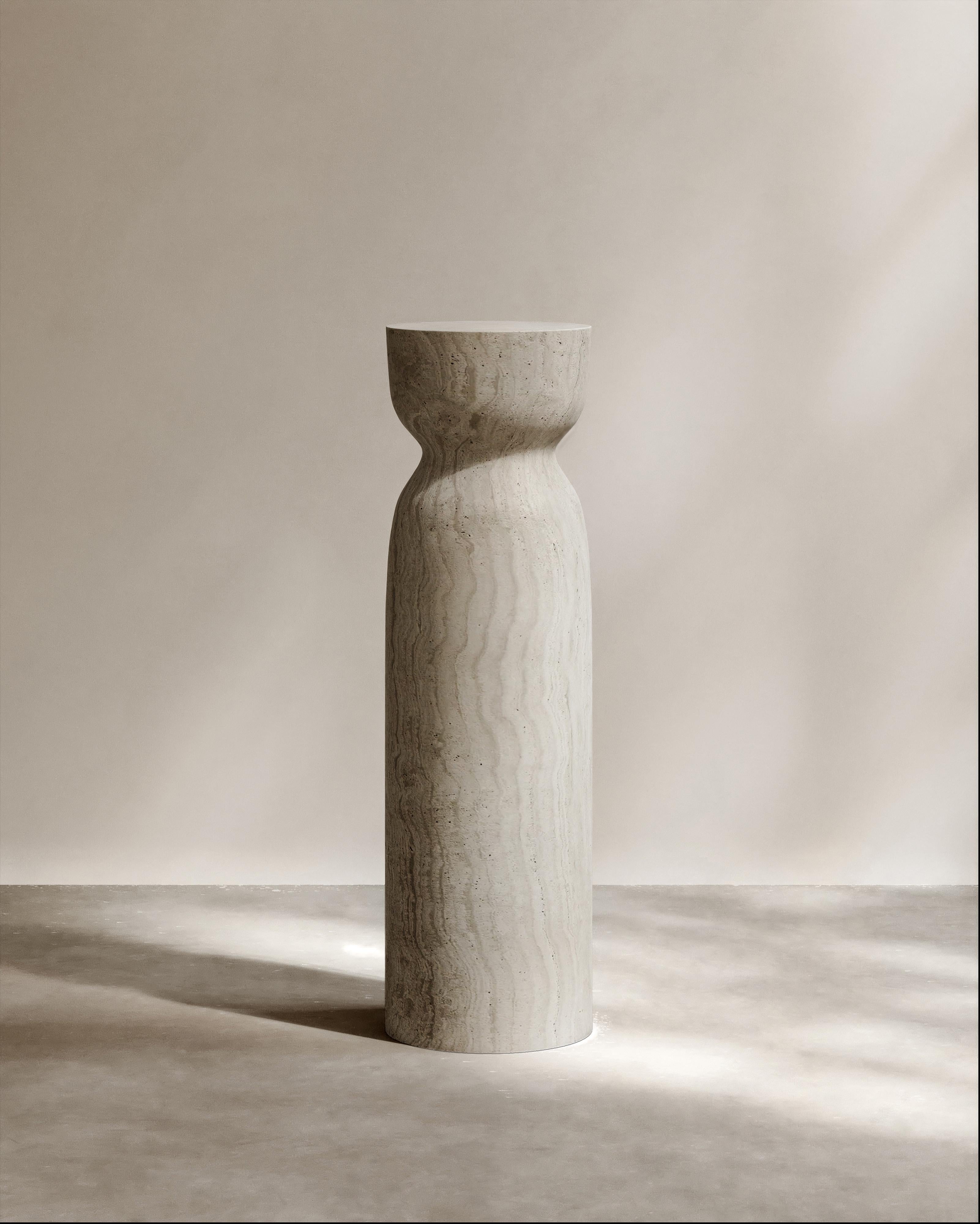 The Dawn Pedestal by Paloma Editions is hand-made in Italy. A tribute in loving memory to Dawn S., its silhouette is articulated by a sculptural hourglass. Our personal favourite, the Natural Pink Onyx quarried amid the sun-bleached hills of