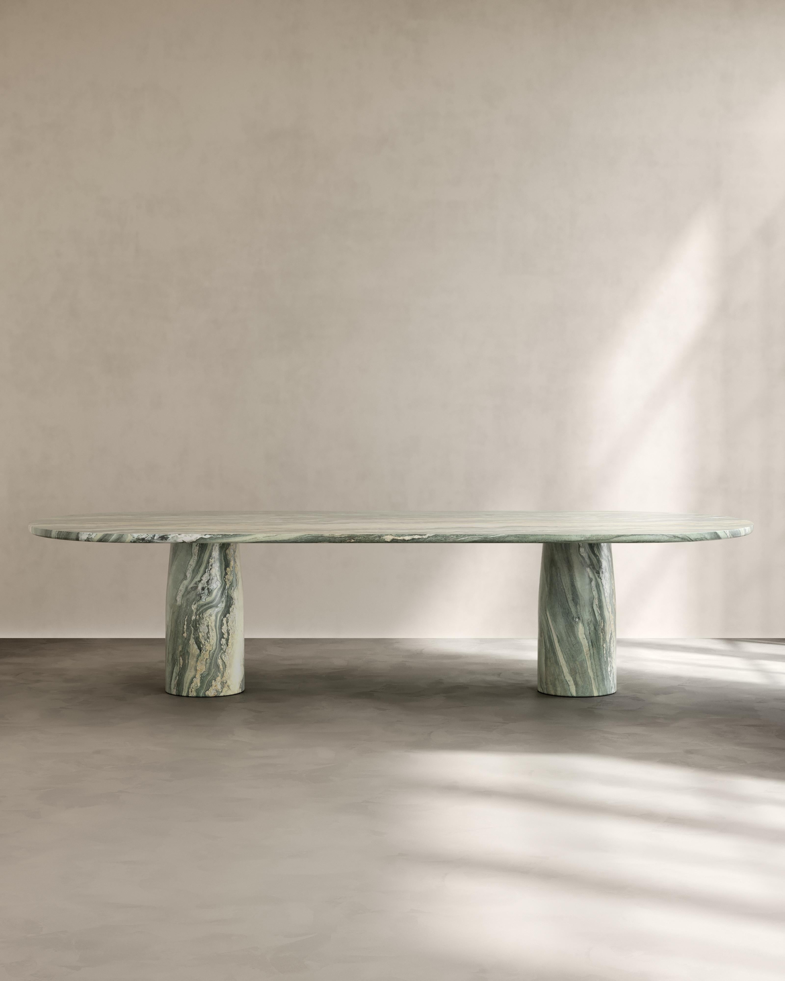 The Isola Table IV by Paloma Editions meditates on material as memory. The Isola Collection draws inspiration from the fleeting moment after coastal rain, when edges blur and colours deepen, and the world feels newly considered. Tapered pillars and