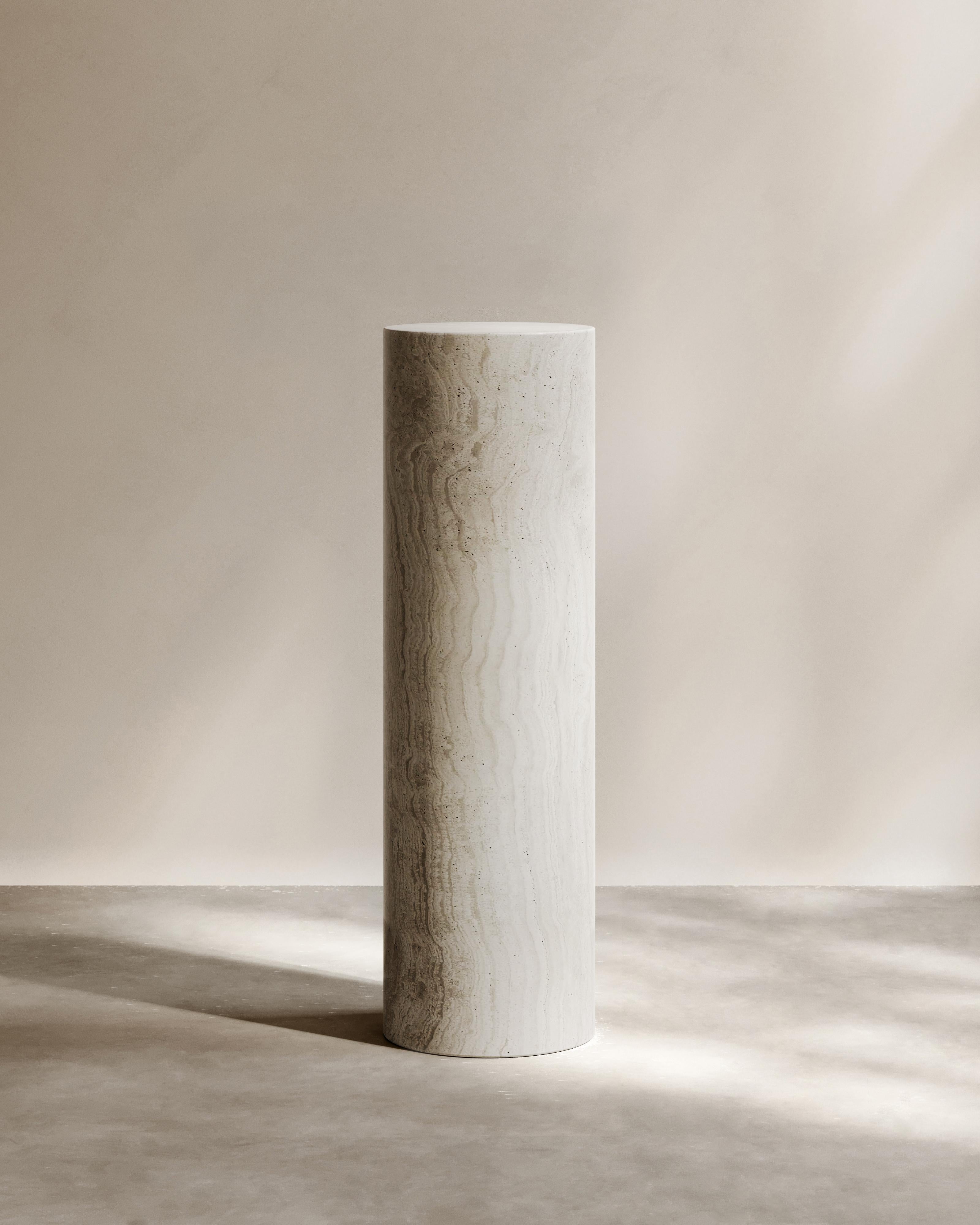 The Portal Pedestal by Paloma Editions is handcrafted in Italy and inspired by the hidden passages of ancient cities. A study in purity of volume and form, it stands effortlessly on its own—whether supporting a sculptural vase or serving as an