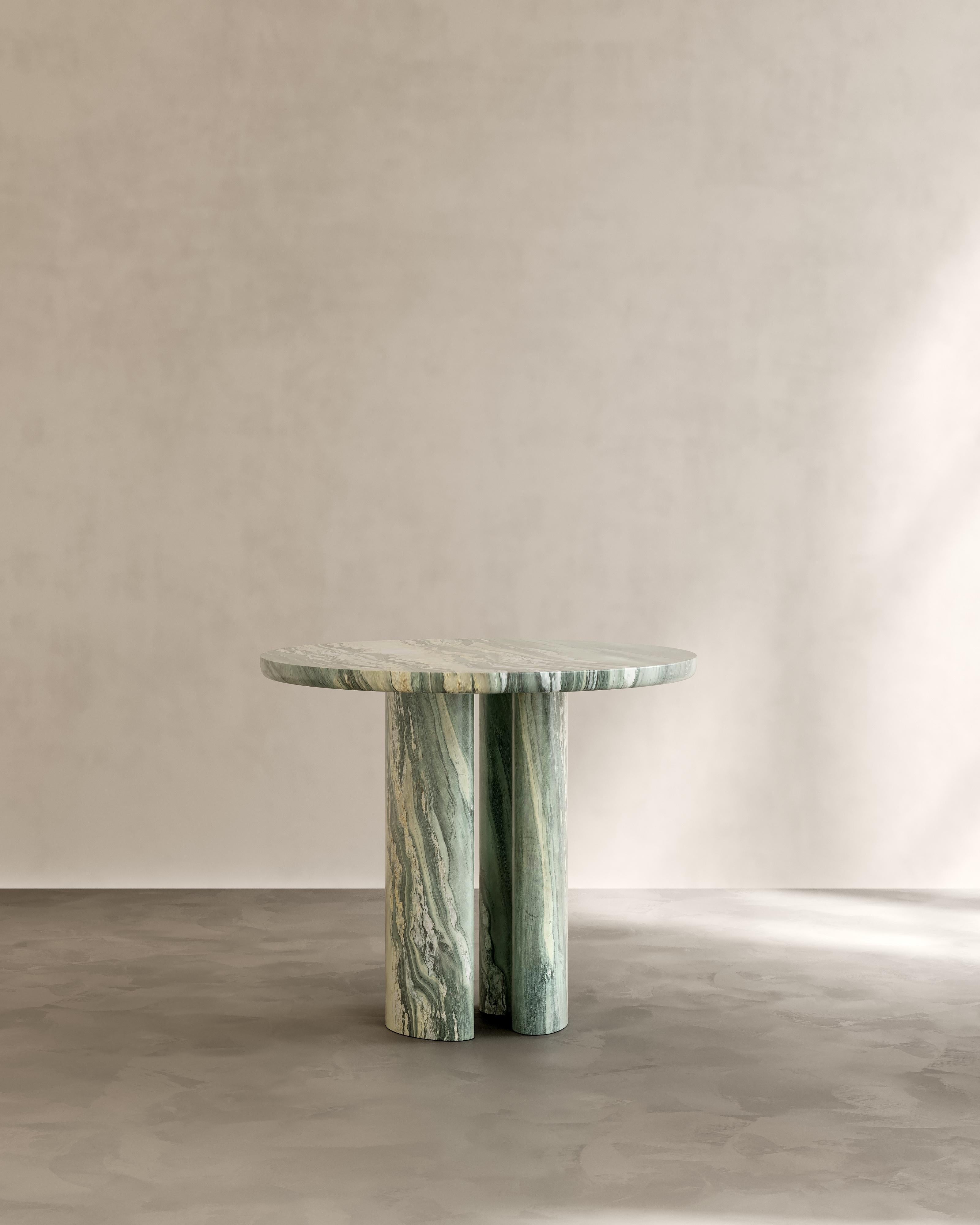 The Isola Dining Table by Paloma Editions is handmade in Italy. Sculpted from solid Italian natural stone. Our workshop on site the quarries near Rome and Carrara draw on generations of master stone masons who transform these materials into enduring