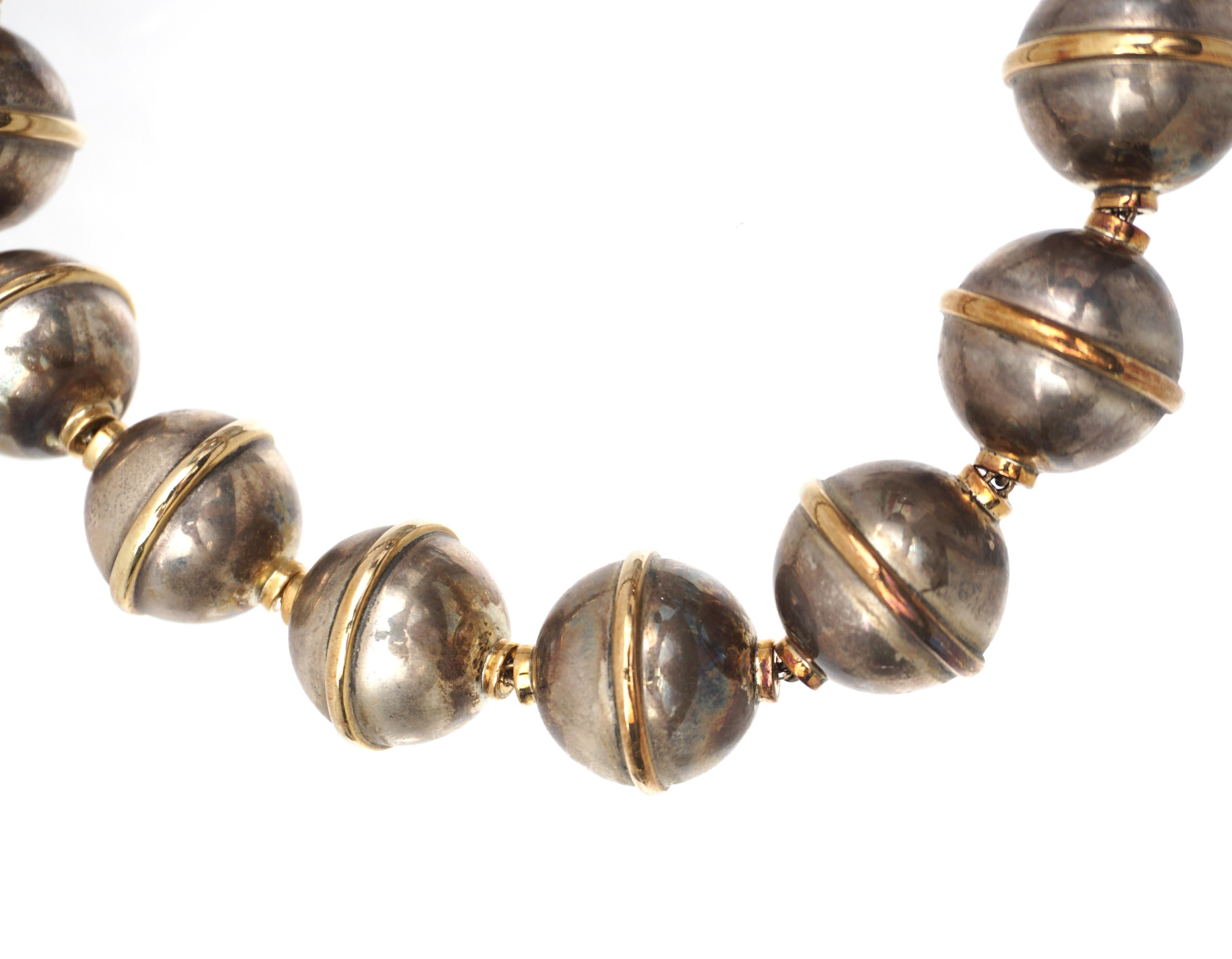 Paloma Picasso for Tiffany & Company, sterling silver bead necklace with 18K gold accent bands. Necklace is well marked 