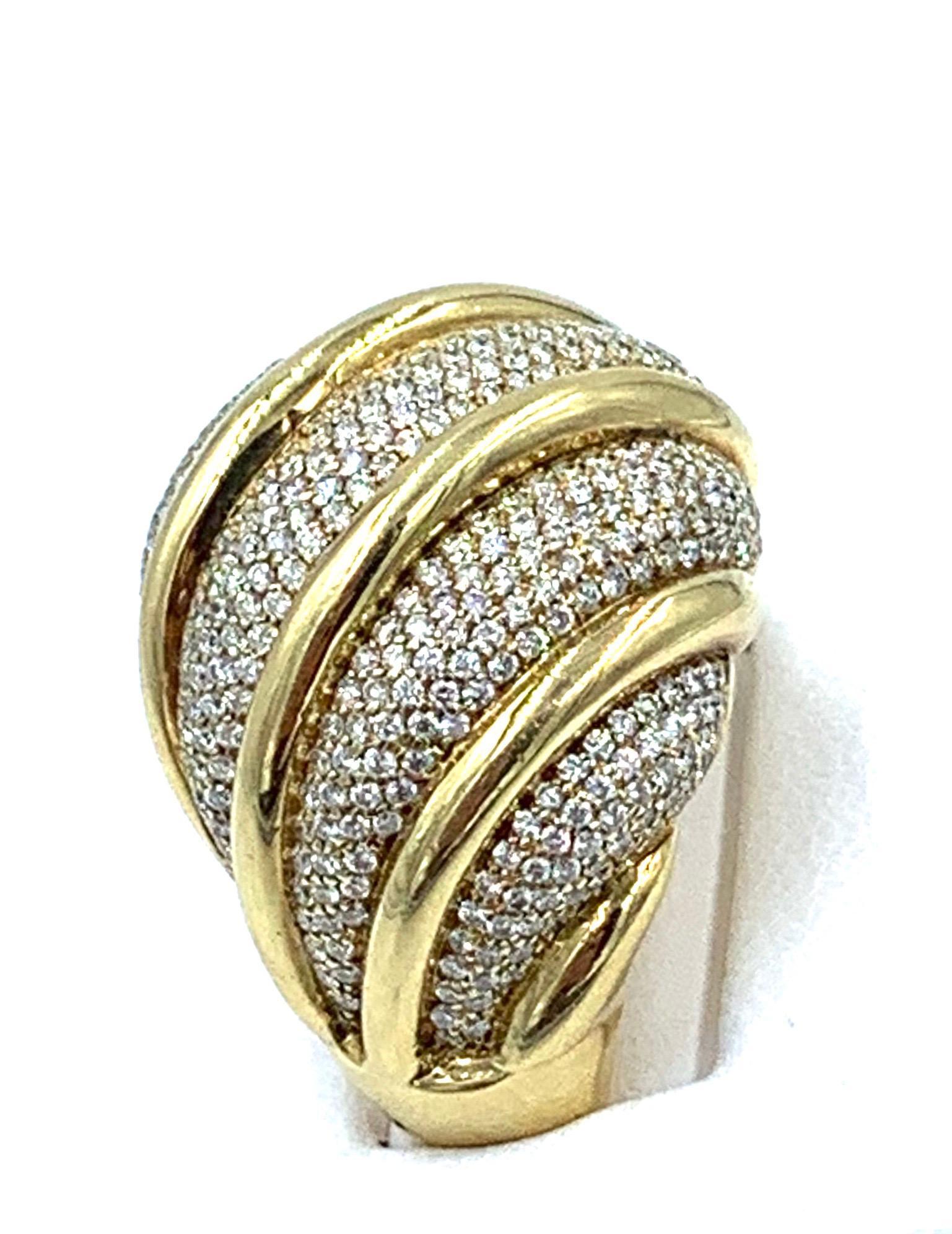 Classic and beautiful 18 karat yellow gold and diamond dome ring.  This is a very wearable and timeless piece by Tiffany’s most famous designer.
Size 6.5
Dia 2.0 carats 
18K Yellow Gold

Signed Paloma Picasso