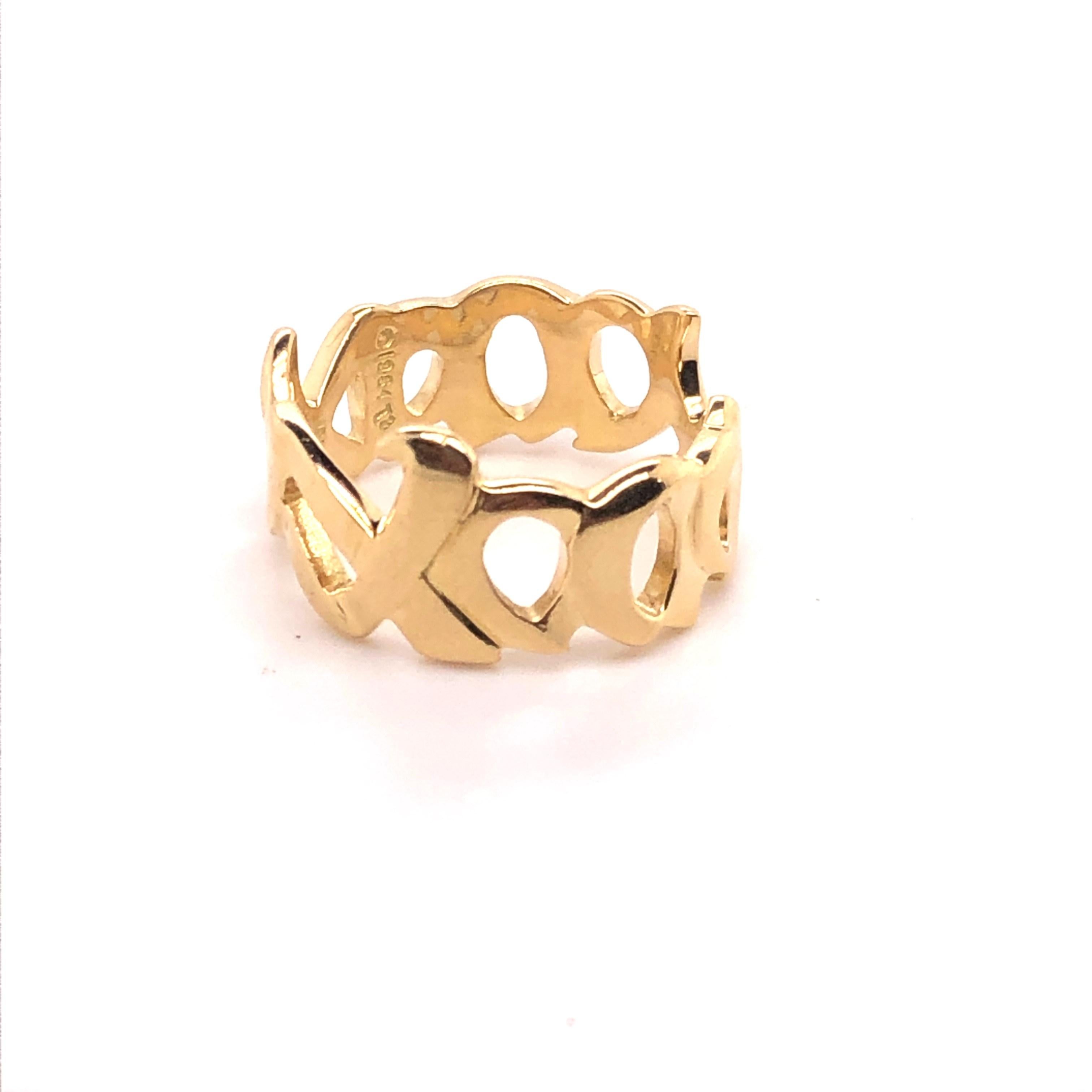 Fashioned in buttery 18kt yellow gold, this classic Tiffany and Co 