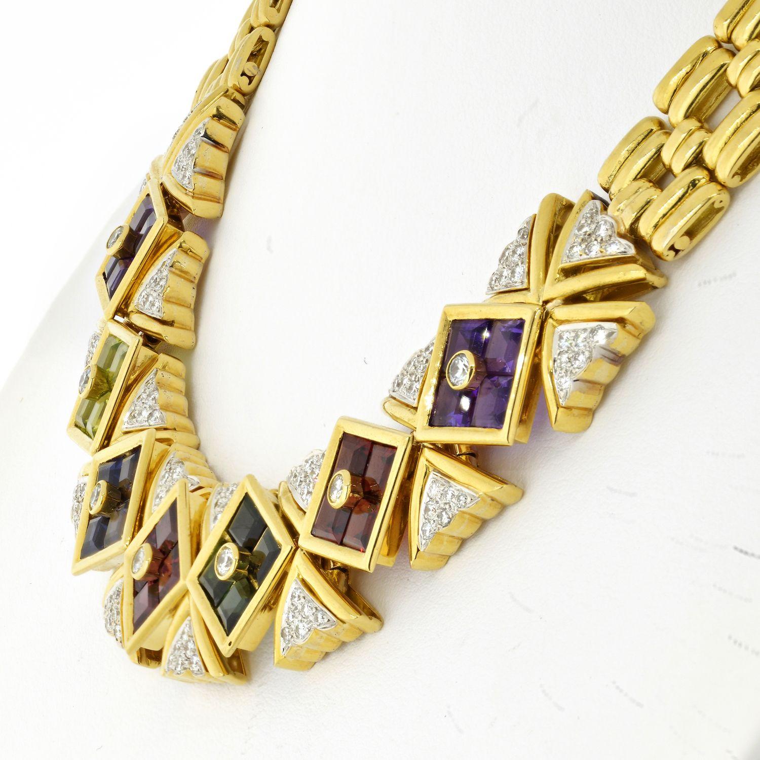 Spectacular 18k yellow gold multi-gem and diamond collar necklace by Paloma Picasso. Comprised of ribbed polished gold links with front facing invisible set square cut gemstones in polished gold surrounds amethyst, peridot, iolite, garnet and pink