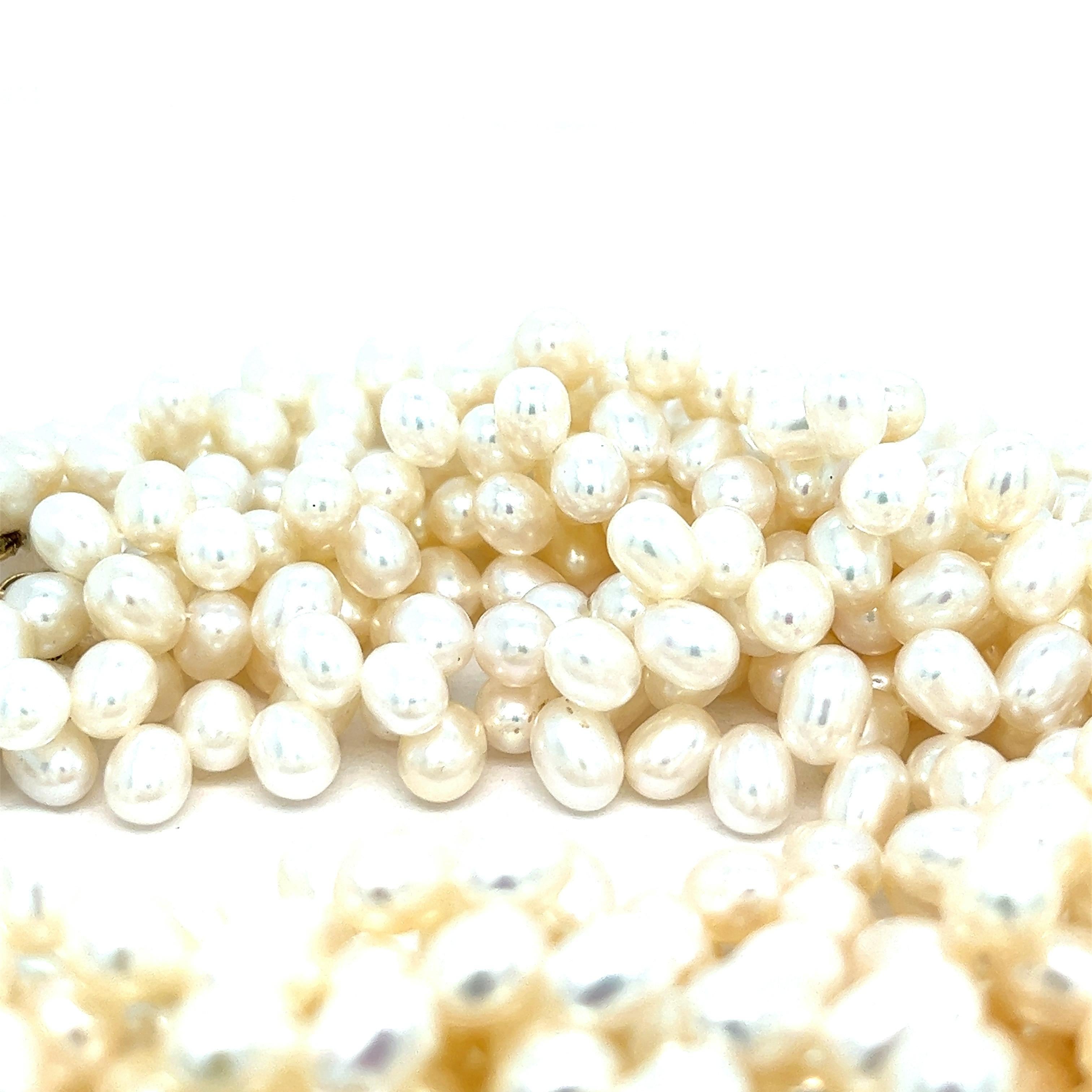 Paloma Picasso for Tiffany & Co. freshwater pearl necklace, circa 1980s

Multiple strands of freshwater pearls with 18 karat yellow gold clasp; marked Tiffany & Co., Paloma Picasso, 750

Size: length 17 inches
Total weight: 238.7 grams