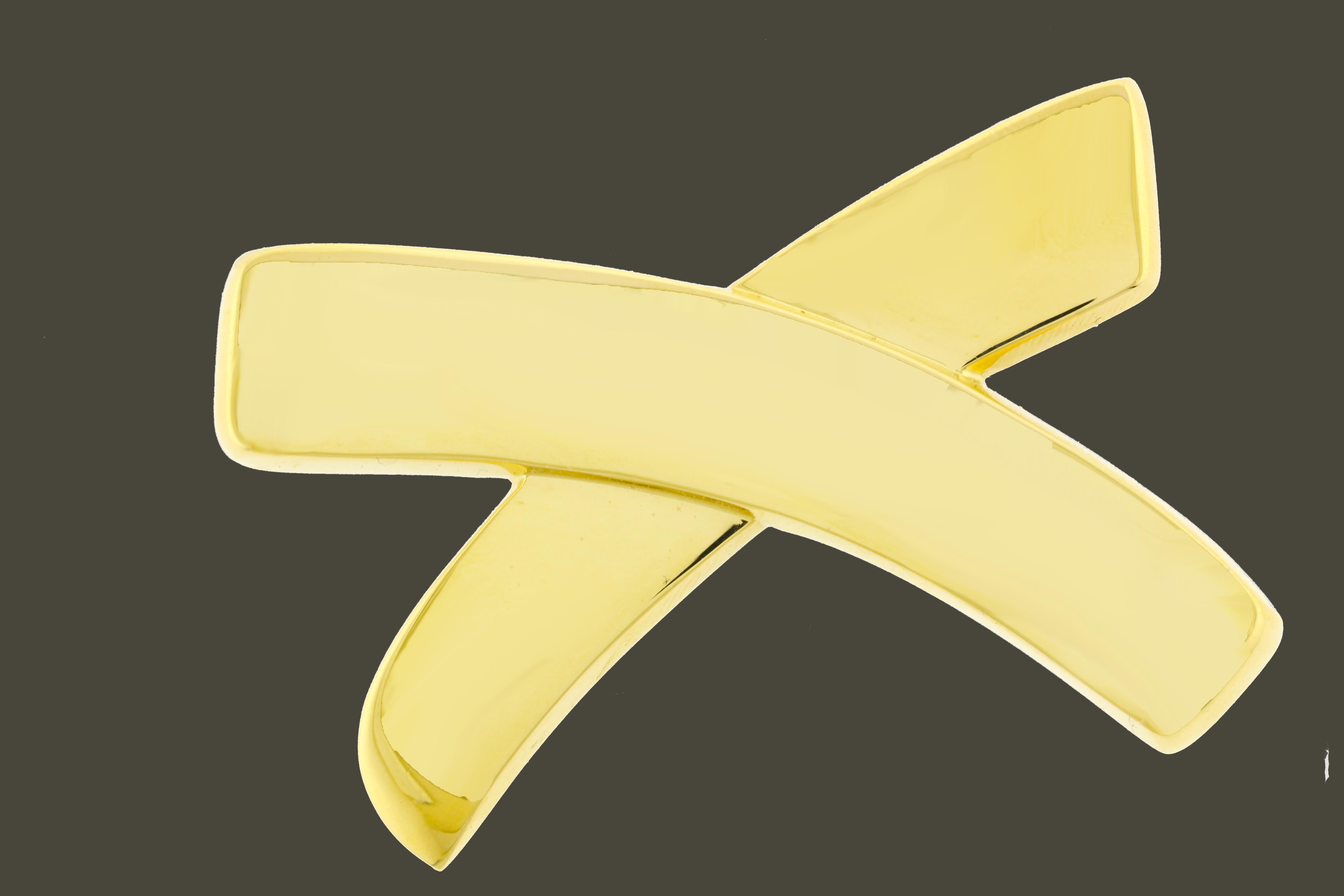 Die Tiffany & Co. Die Paloma Picasso X Brosche ist ein auffälliges Schmuckstück, das aus luxuriösem 18-karätigem Gelbgold gefertigt ist. Mit einer Größe von 2,4 x 1,7 Zoll und einem Gewicht von 28,9 Gramm zeigt dieses gewagte Accessoire das kultige