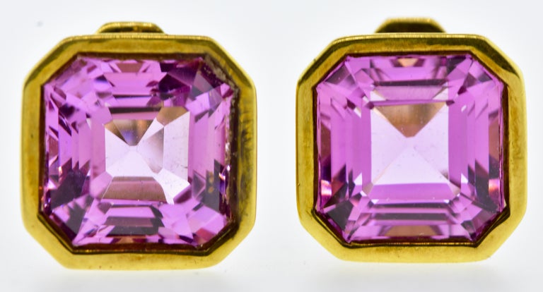 Paloma Picasso for Tiffany and Co. 18K yellow gold earrings centering fine Asscher cut natural bright pink tourmalines.  The finely matched bubble-gum pink tourmalines are estimated to weigh 7.30 cts.  These earrings are now for a non pierced ear