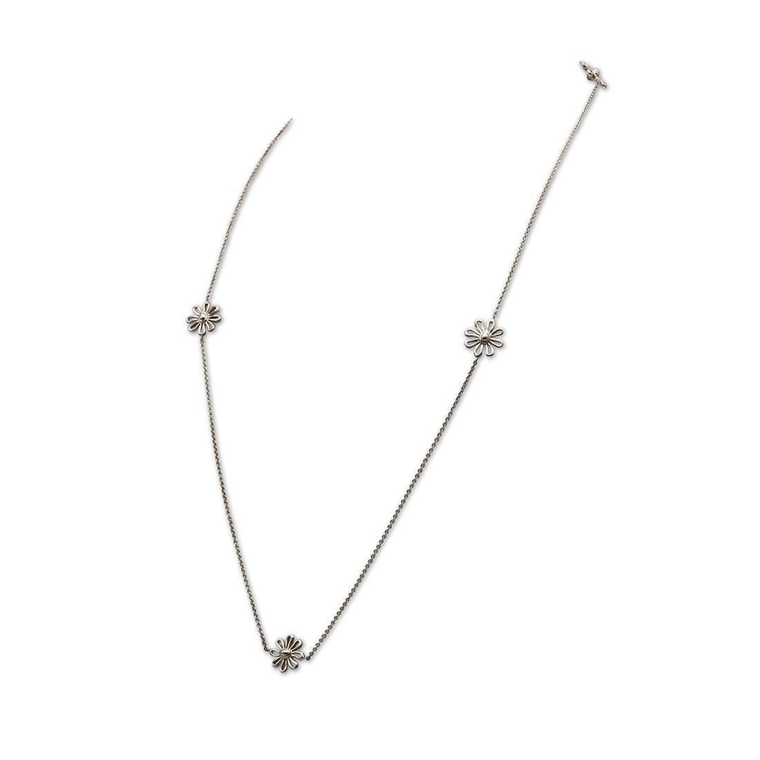 Authentic Paloma Picasso for Tiffany & Co. necklace crated in sterling silver featuring five daisy flower stations. The chain measures 27 inches in length and each daisy measures 14.5 mm in width. Signed Paloma Picasso, Tiffany & Co., 925. Necklace