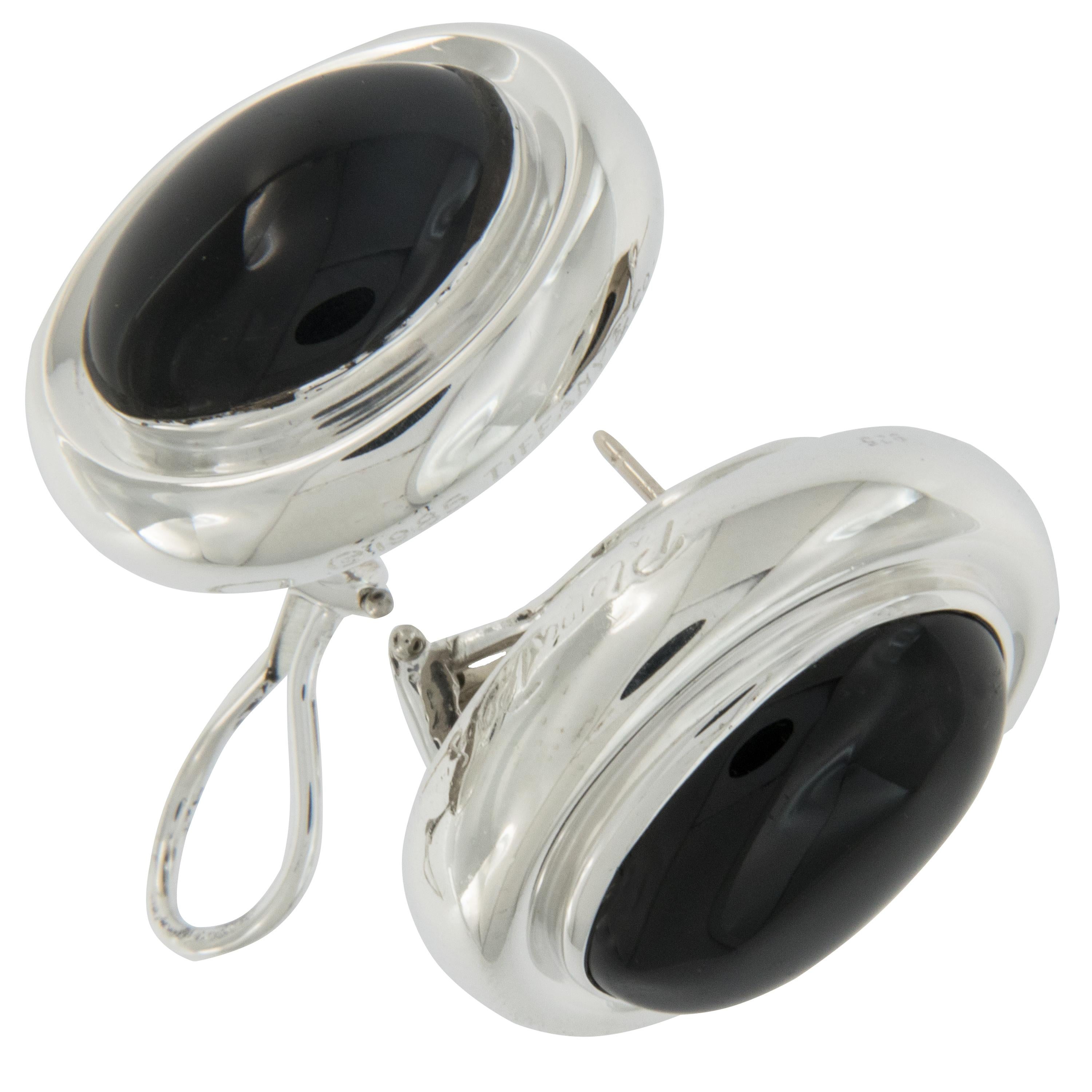 What is more versatile than a pair of black onyx & silver earrings designed by Paloma Picasso for Tiffany & Co. ? These estate black onyx oval cabochon earrings go with everything and have posts & omega clip backs for secure wearing & perfect fit!