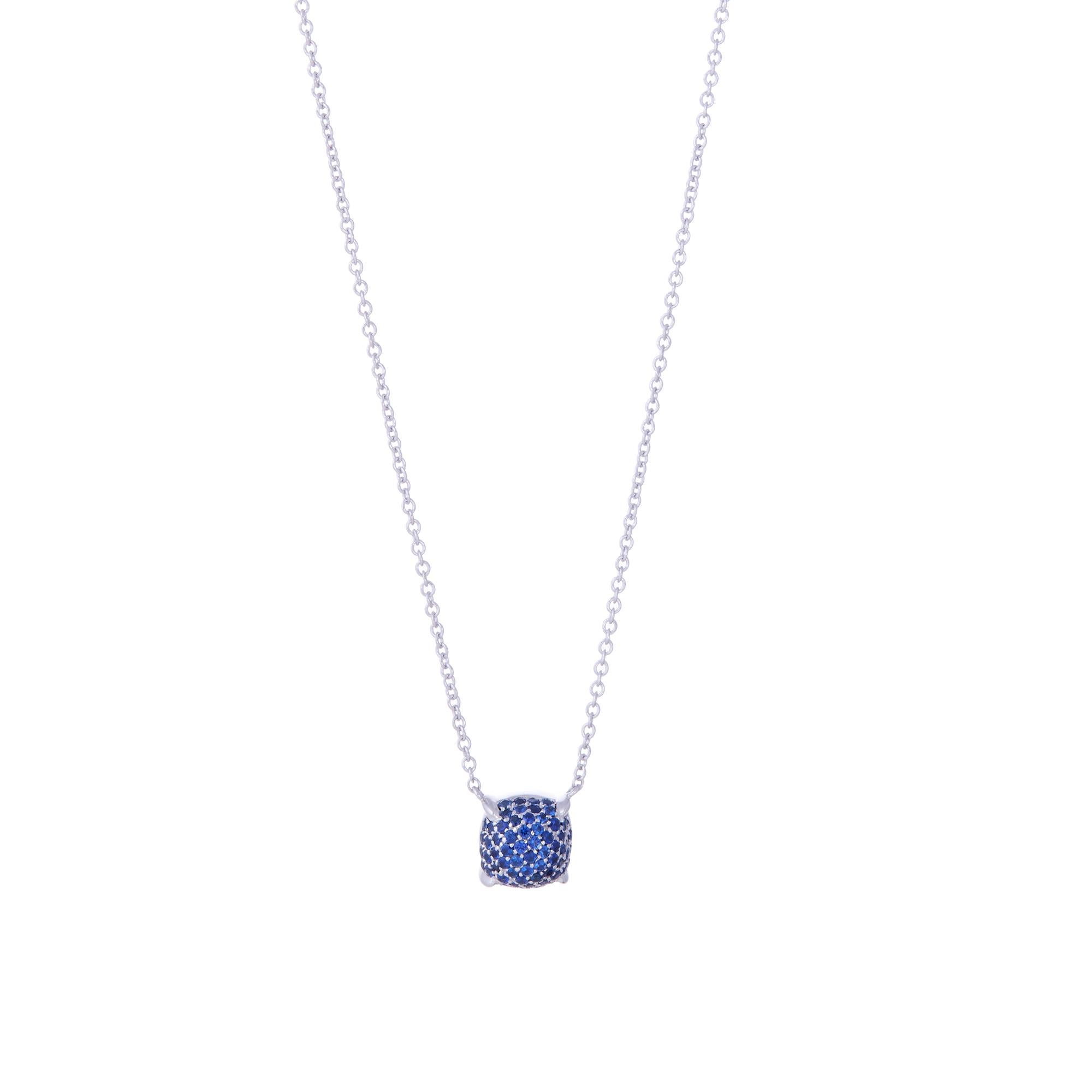 Authentic Paloma Picasso for Tiffany & Co. pendant necklace crafted in 18 karat white gold.  The pendant is set with faceted round sapphires of approximately 0.45 total carats and is situated on a delicate 18 1/4 inch chain.  Signed Paloma Picasso,