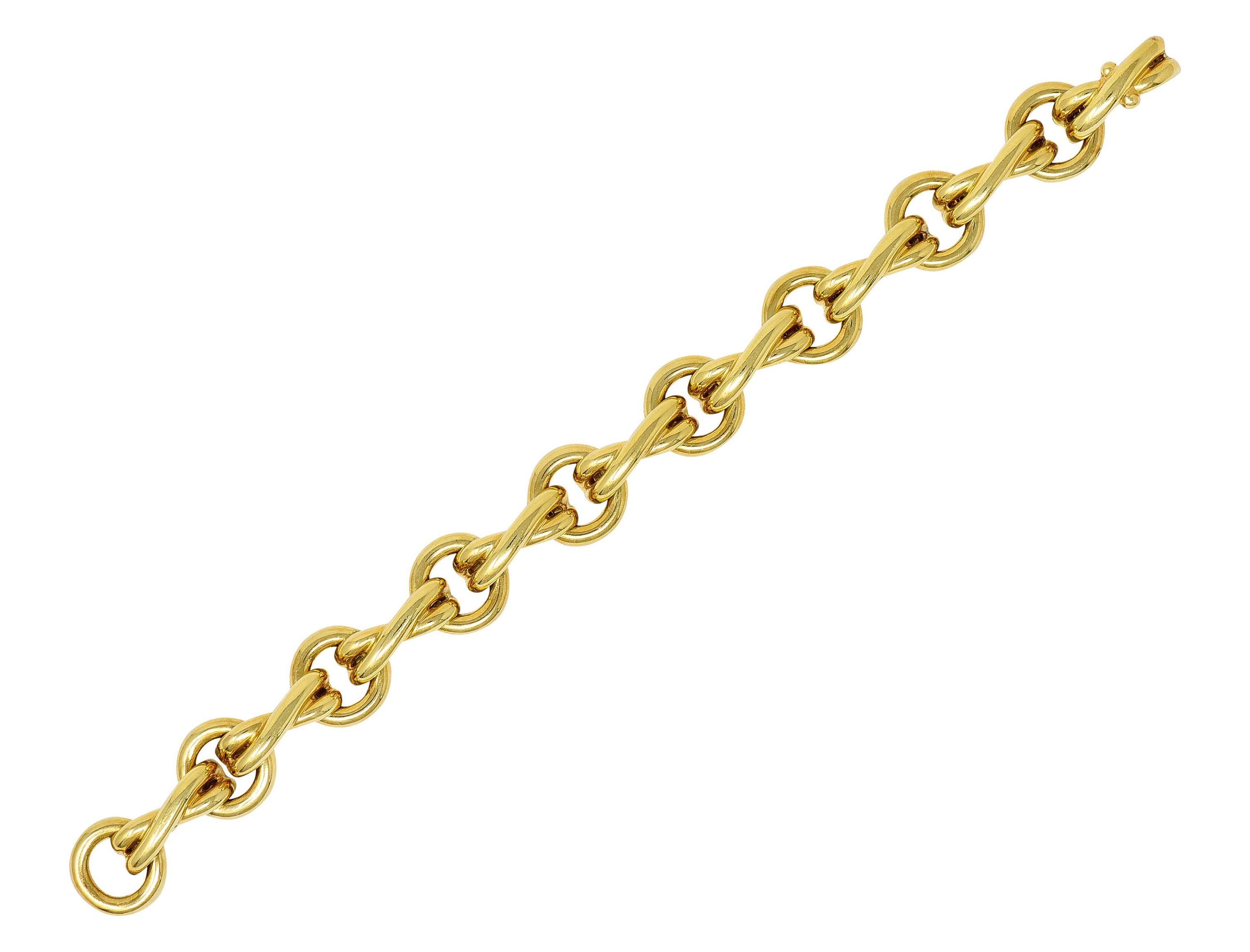 Bracelet is comprised of circular spacer links alternating with stylized X bar links

Featuring a brightly polished finish

And a concealed fold-over clasp

Stamped 750 for 18 karat gold

Fully signed Tiffany & Co. Paloma Picasso

From the Graffiti