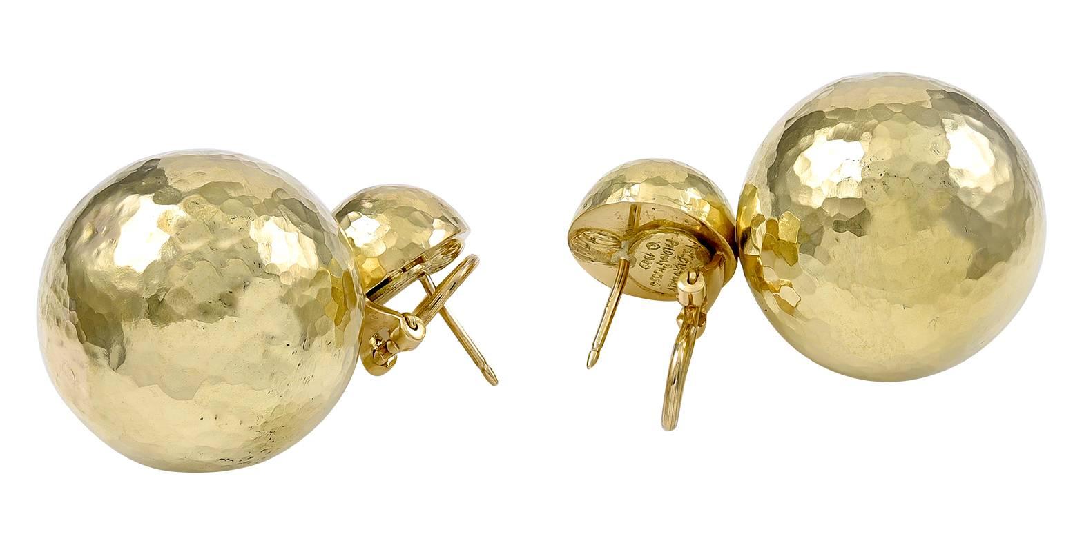 Double sphere/ball drop earrings.  Made and signed by Paloma Picasso for TIFFANY & CO.  Crisp hand-hammered finish.  Three-dimensional.  18K yellow gold.  1 1/2