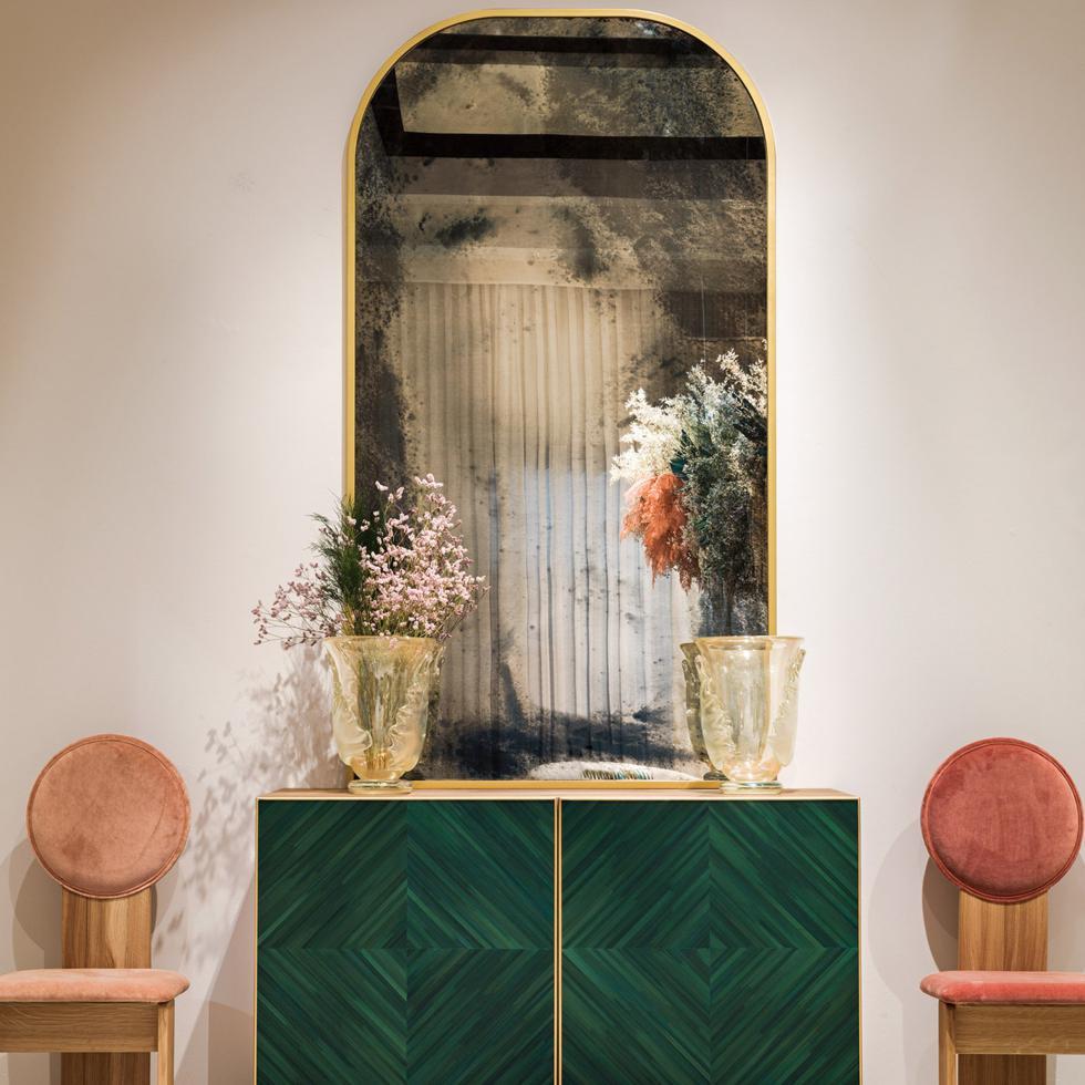 Handcrafted oak wood sideboard with two doors. Outside in oak wood, natural color, and mat finish. Doors are decorated with straw marquetry and brass elements. Glossy lacquered finish in green color, mirror inserts, and glass shelves inside.