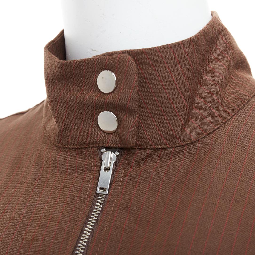 PALOMA WOOL brown linen organic cotton pocketed sleeveless top XS
Reference: SNKO/A00460
Brand: Paloma Wool
Material: Linen, Cotton
Color: Brown
Pattern: Pinstriped
Closure: Zip
Extra Details: Chocolate brown recycled polyester blend stretch-design