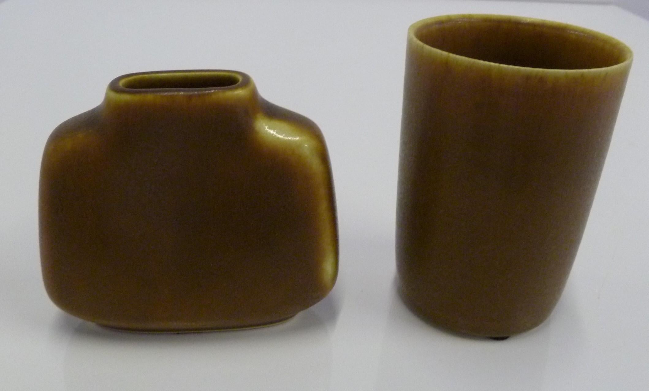 Two Scandinavian Modern Danish hand thrown Pottery Vases by Per and Annelise Linnemann-Schmidt for Palshus from the 1960s. Lovely simple shapes with a soft smooth feel of the mottled tan glaze over a cream colored body. In excellent condition, no