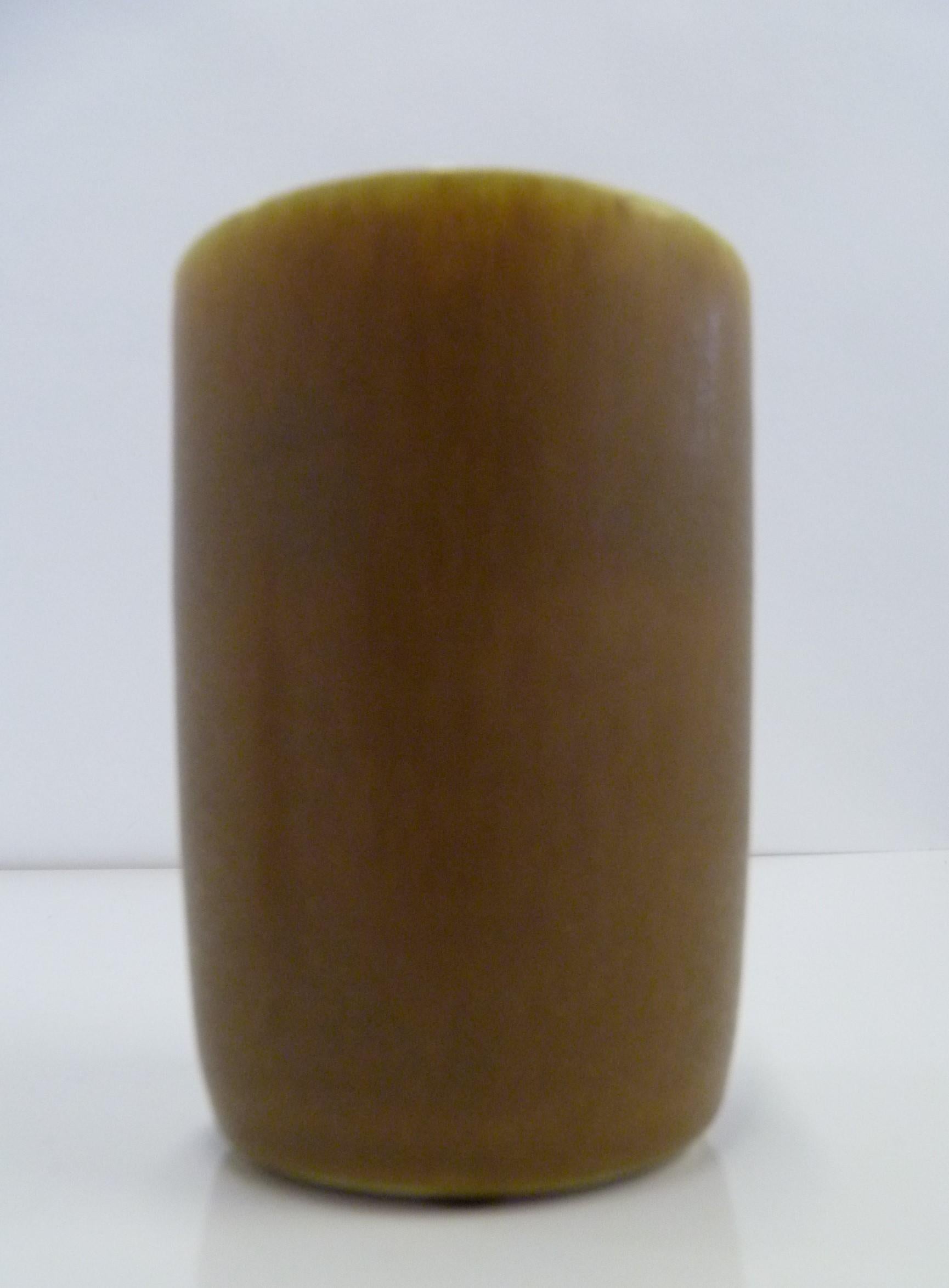 Scandinavian Mid-Century Modern Danish hand thrown pottery vase by Per and Annelise Linnemann-Schmidt for Palshus from the 1960s. Lovely simple shape with a soft smooth feel of the mottled tan glaze over a cream colored body. In excellent condition,
