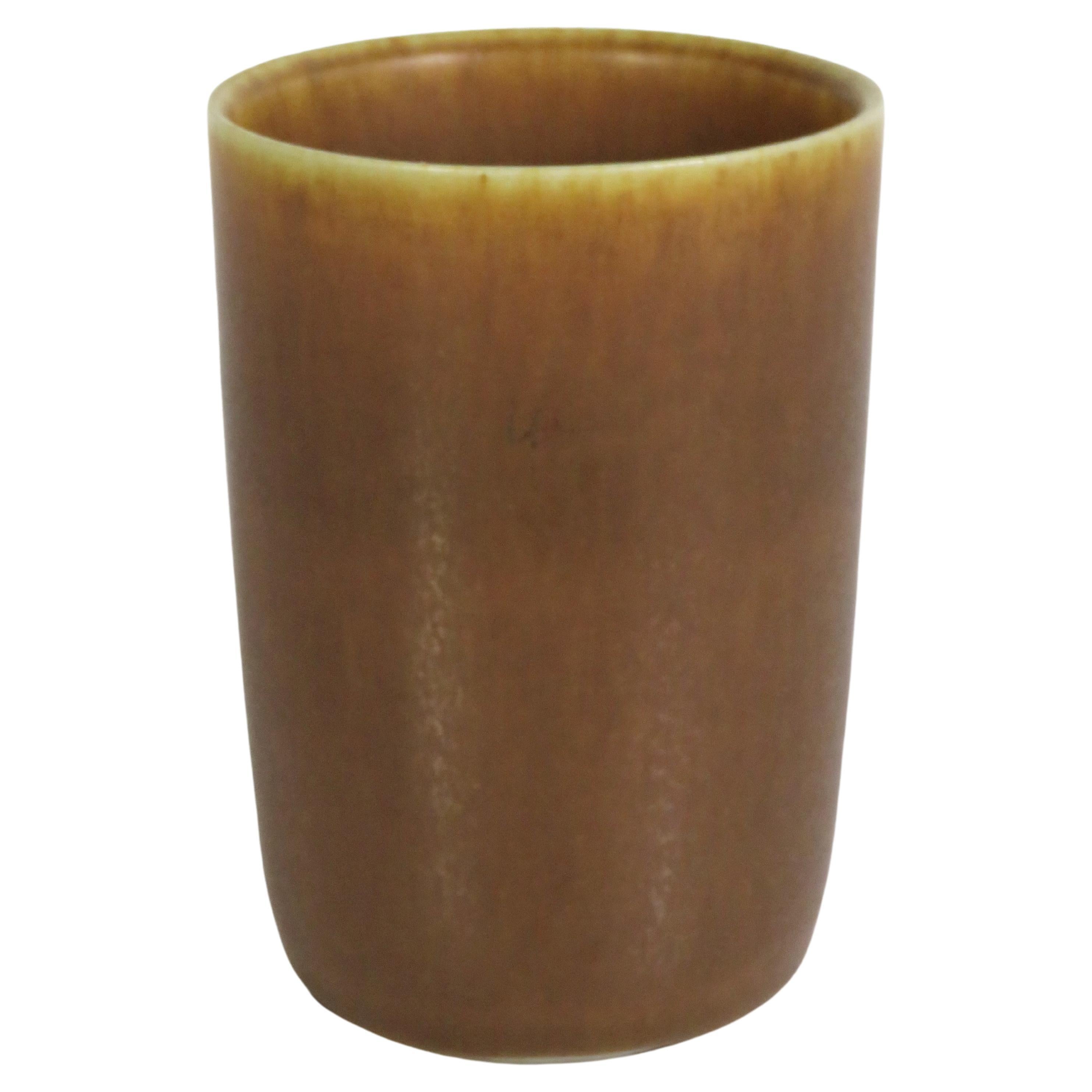 Scandinavian Mid-Century Modern Danish hand thrown pottery vase by Per and Annelise Linnemann-Schmidt for Palshus from the 1960s. Lovely simple shape with a soft smooth feel of the mottled tan glaze over a cream colored body. Incised on bottom