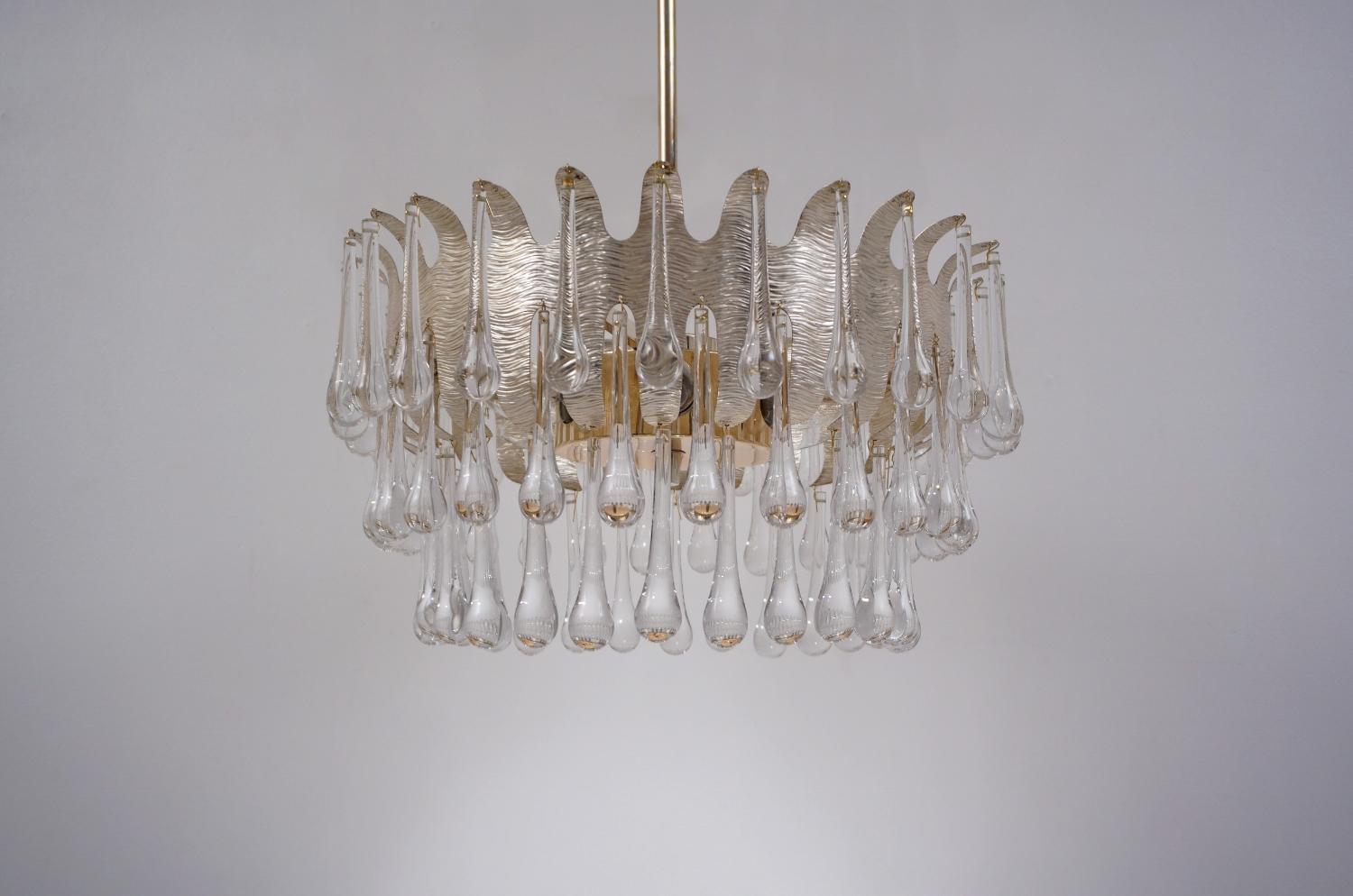Palwa, silver plated frame with 78 crystals, possibly by Ernst Palme, 1960s, German.

This chandelier has been thoroughly cleaned respecting the vintage patina. Newly rewired & earthed with gold silk cable, in full working order & ready to