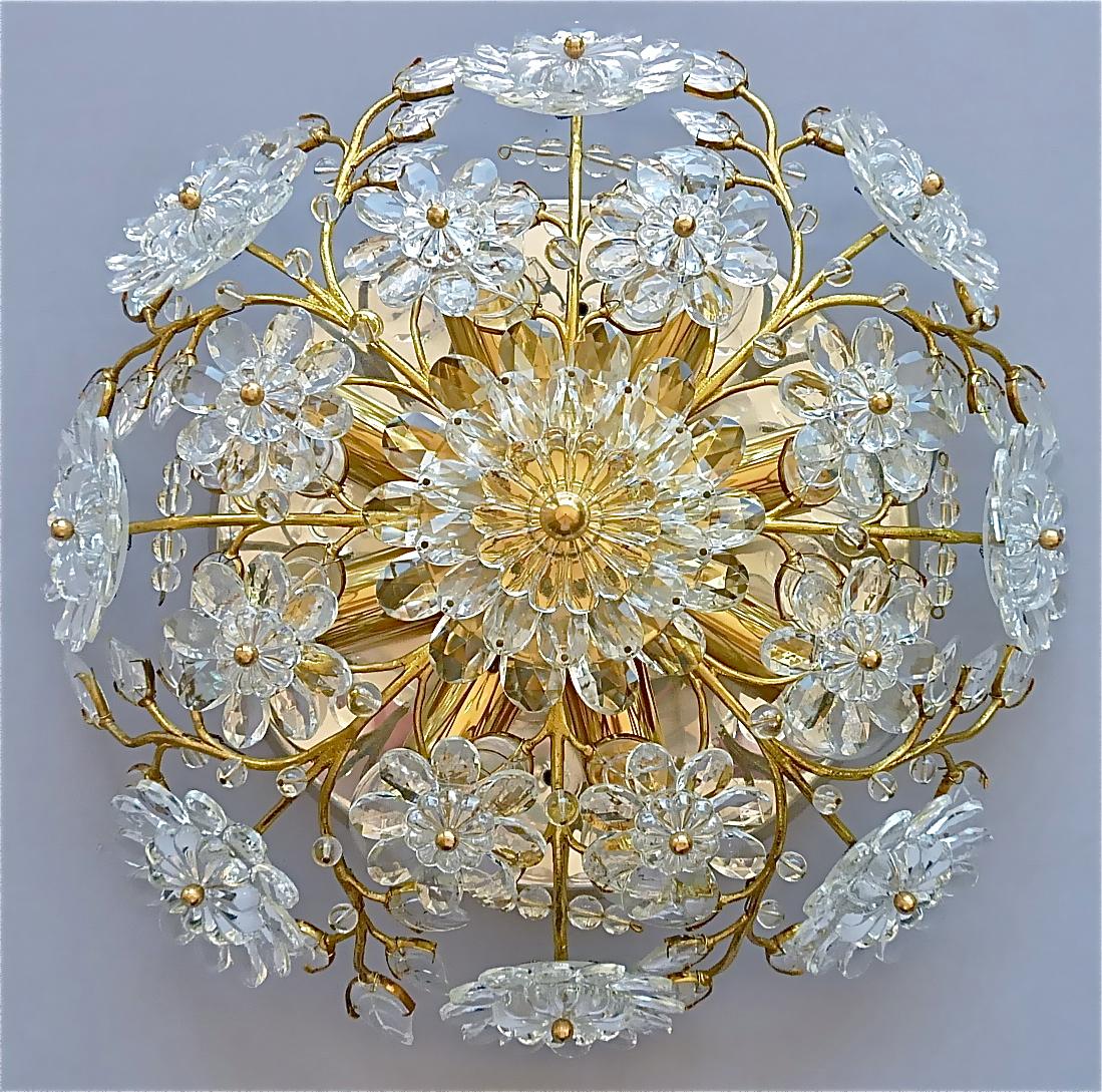 Round chromed and gilt metal crystal glass floral flush mount chandelier made by high class lighting company Palwa, Germany, circa 1960s, documented in the Palwa sales catalog and labeled with Palwa tag and model number. Often wrongly attributed to