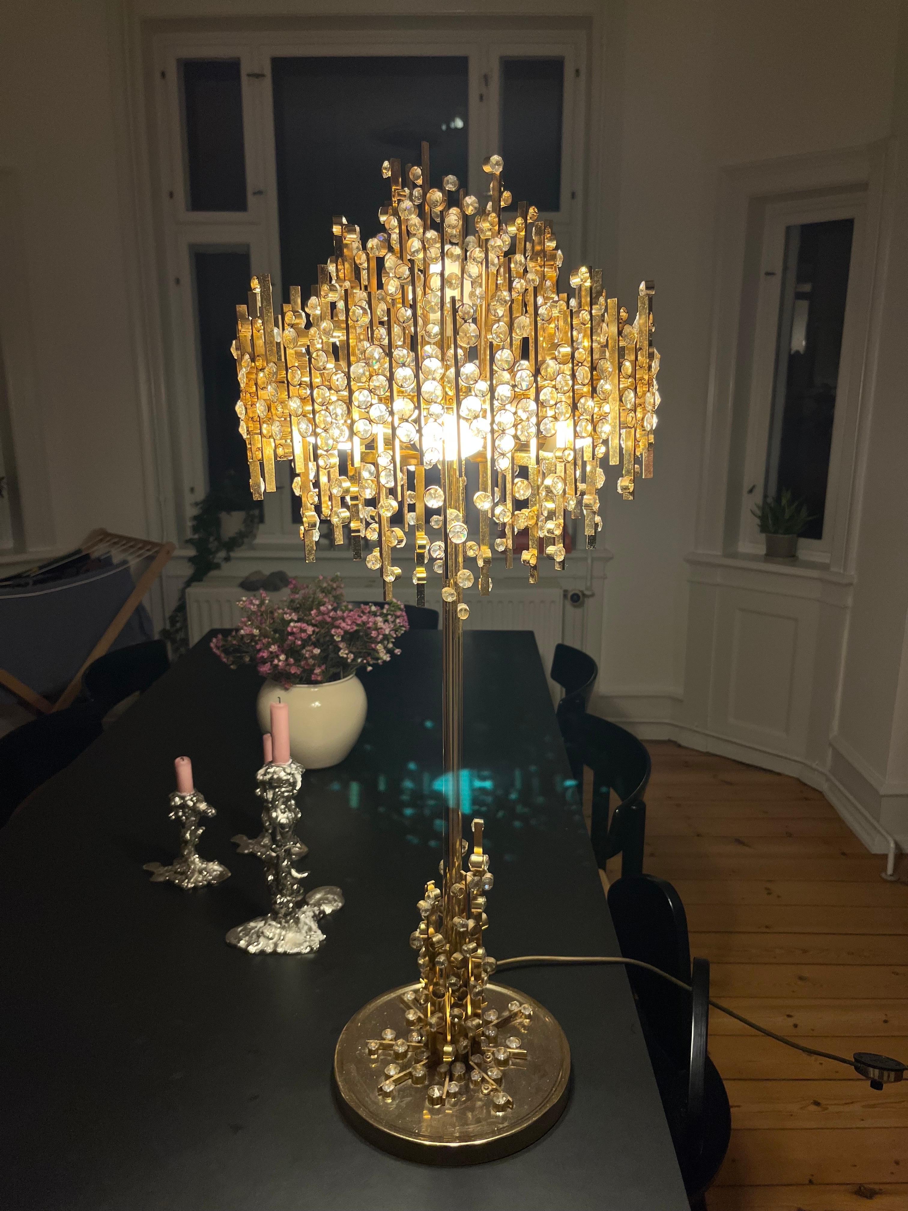 Large and impressive Palwa lamp in metal gilt with gold setting of numerous diamond cut crystal by Palwa 1970s Austria.
Outstanding tall piece can be used as a floor lamp or table lamp.
