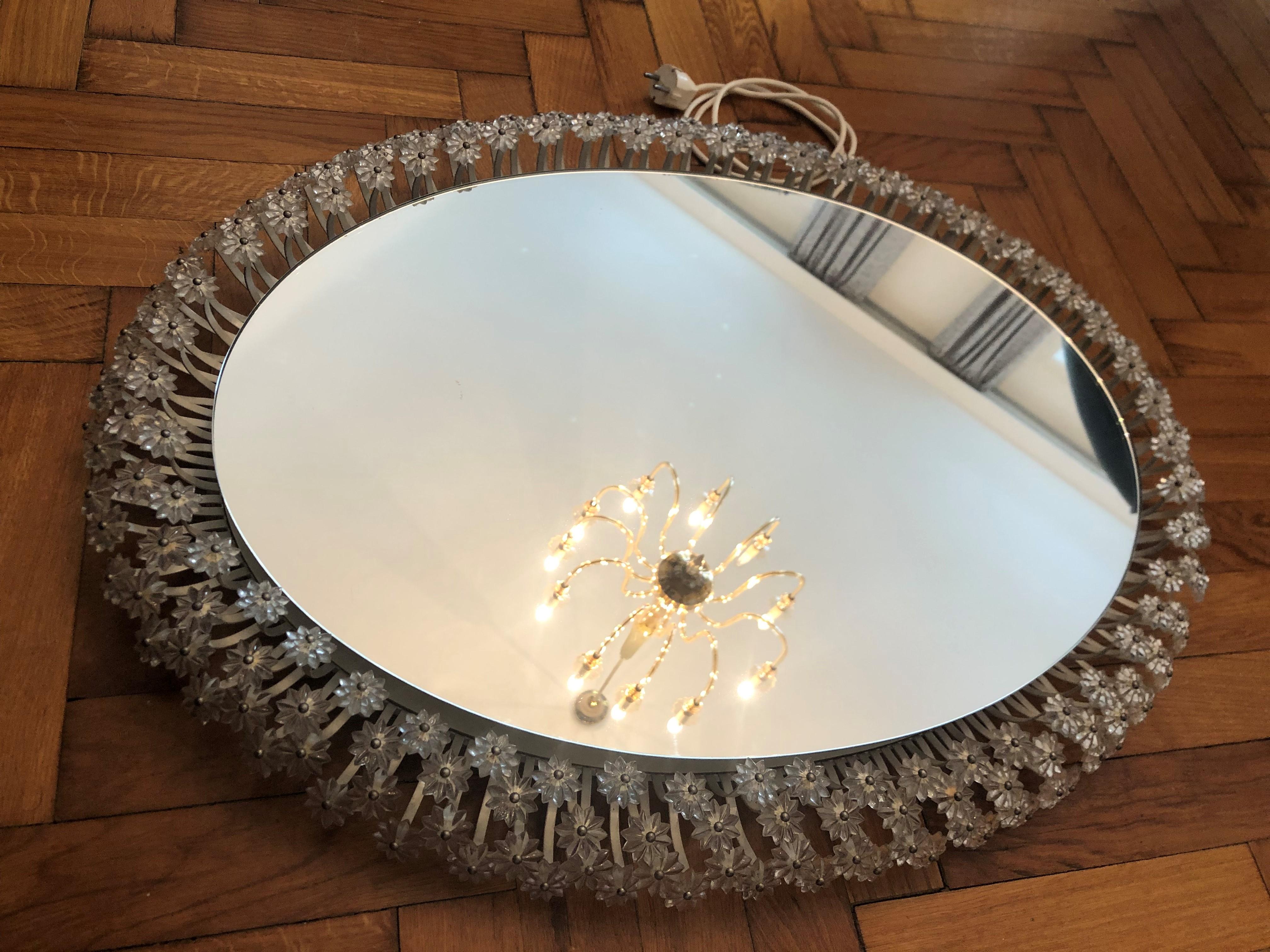 Mid-Century Modern Palwa, Oval Backlit Wall Mirror, white painted metal and Crystal Flowers For Sale