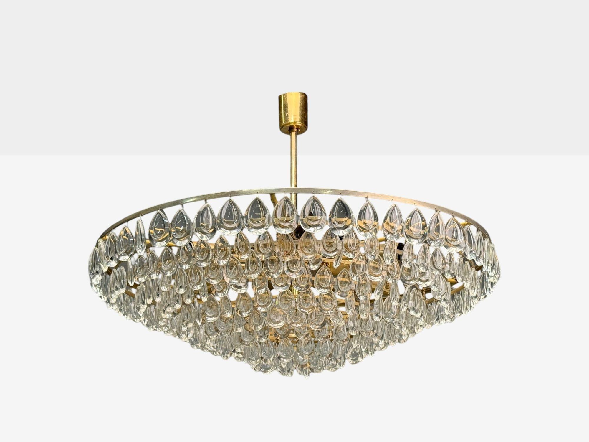 Palwa, Mid-Century Modern, Teardrop Glass, Brass, Eight Tier Chandelier, Germany, 1960s

Interesting chandelier having teardrop glass pieces hanging from 8 patinated brass tiers designed and produced by Palwa in Germany c. 1960s. This example has 13