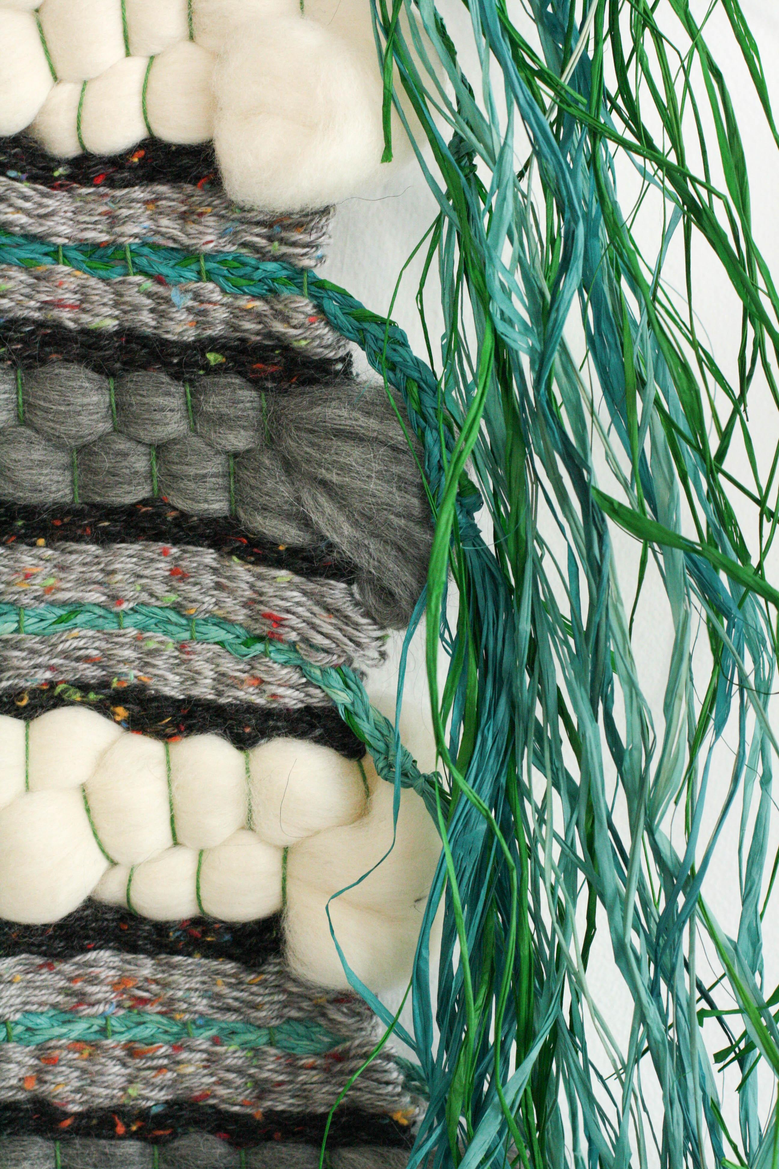 Textural, soft, and vibrant woven sculpture using raffia, roving, and cotton.

Artist Statement:
