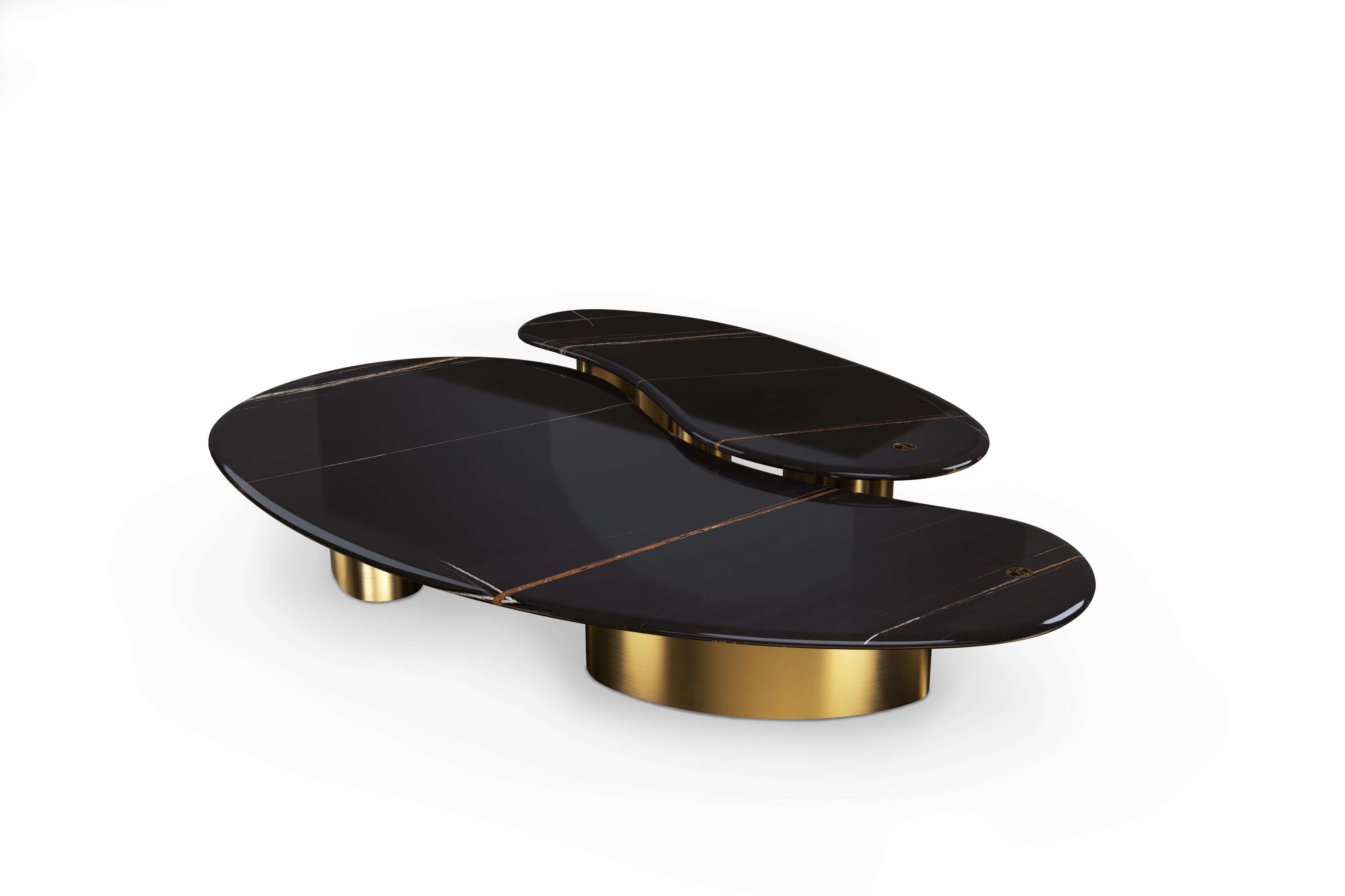 Pam Petit organic marble center table set in brass by Mansi London

Center table set with an irregular, organic shape of the top and legs. 
Refined Azerocare® marble top, signed with a 24KT gold plated logo. 
The base is finished with a liquid brass