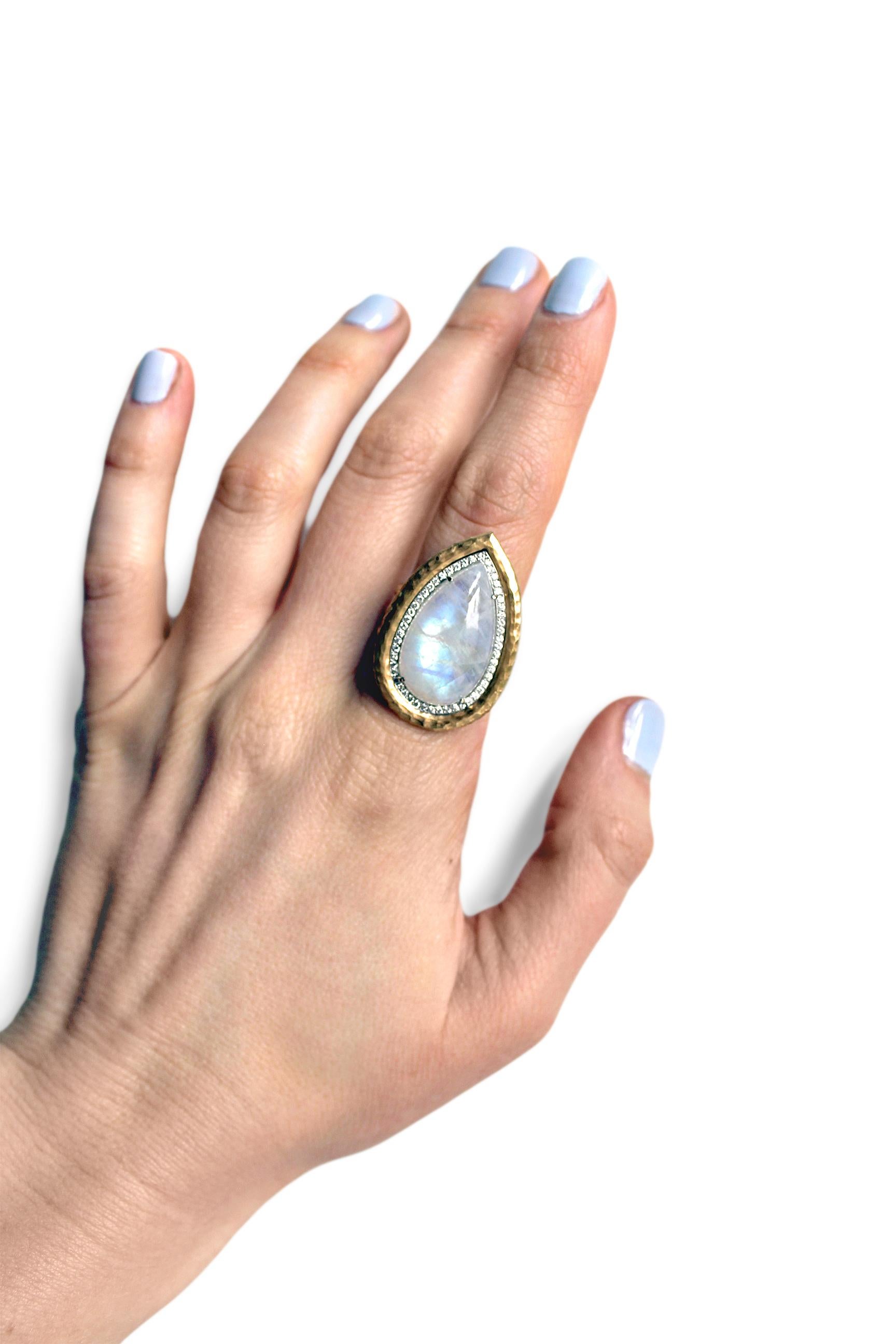 One-of-a-Kind Empress Ring handcrafted by jewelry designer Pamela Froman in hammered and matte-finished 18k yellow gold featuring an exceptional 14.74 carat pear-shaped rainbow moonstone cabochon and accented with 0.26 total carats of round