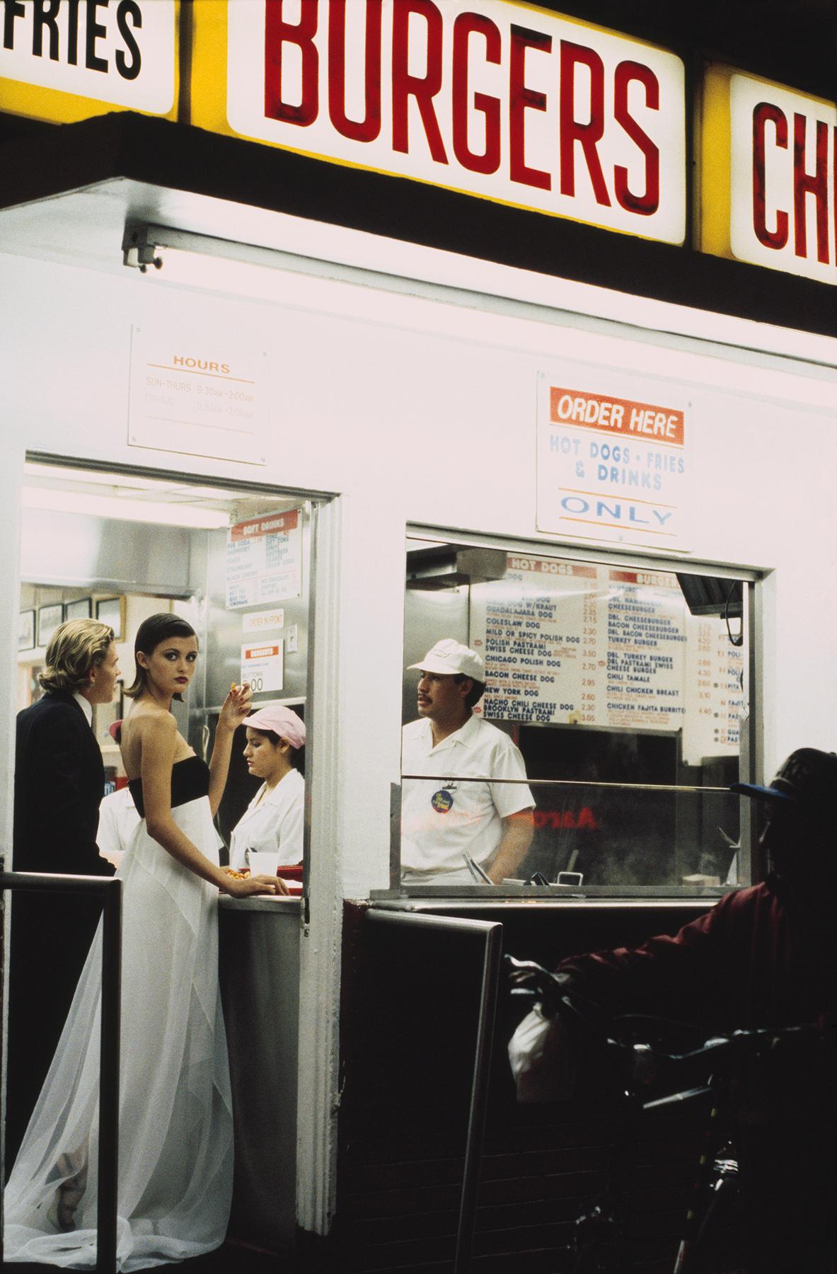 Color Photograph di Pamela Hanson - Hot Dog Stand II: Trish Goff, Los Angeles, VOGUE, 1994