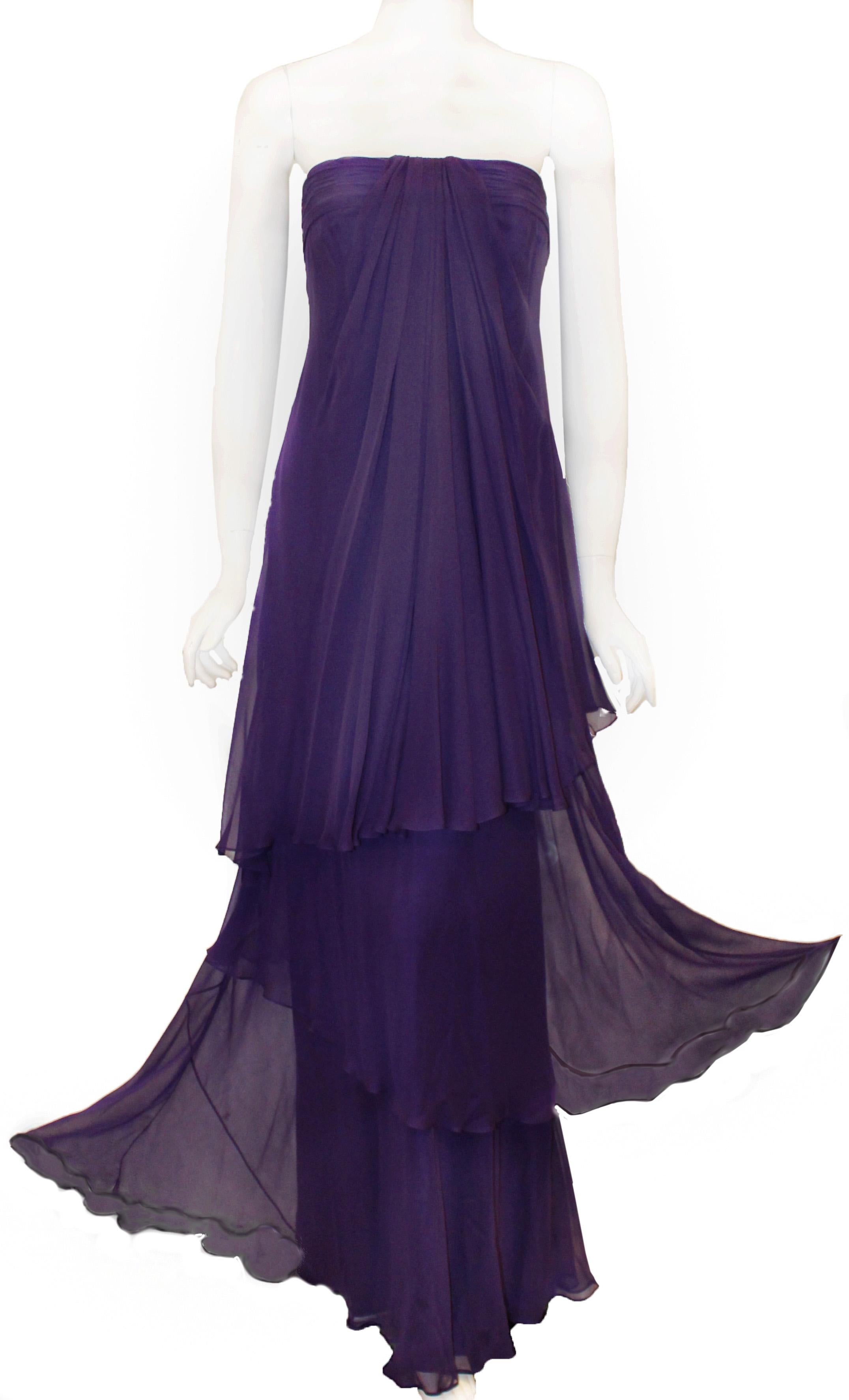 Pamela Roland elegant three tier purple silk strapless gown is lined in purple silk charmuese.  This outstanding evening gown is gathered at the bust and drapes down the first tier to the hips.  All 3 tiers start at the bust and drape to the floor. 