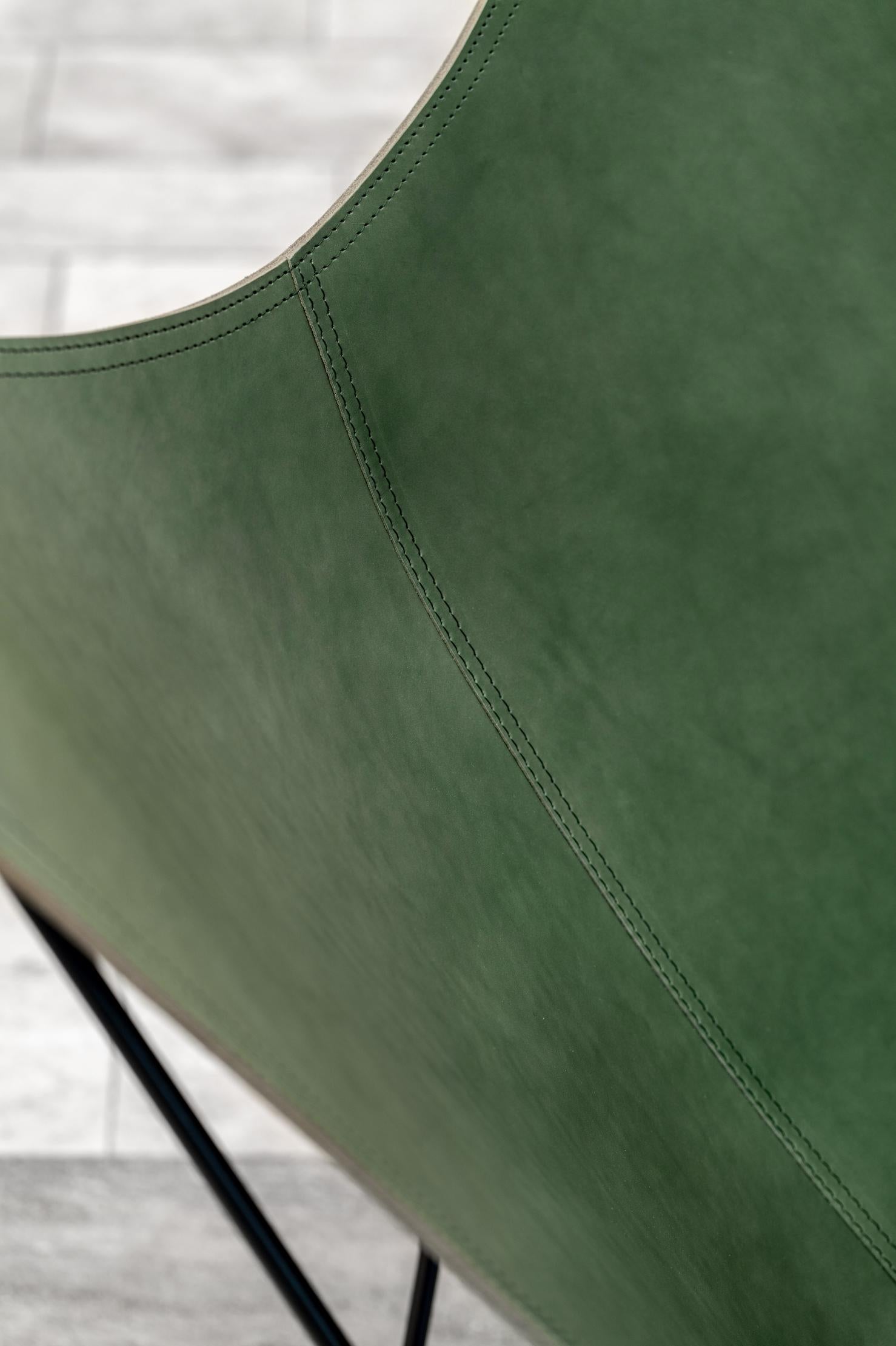 Pampa Mariposa Lounge Chair by Cuero Design
Dimensions: D 86 x W 87 x H 92 cm.
Materials: Leather and metal.
Finish: Grass Green leather and black frame.
Weight: 12 kg.

Available in different upholstery and metal color options and finishes. Prices