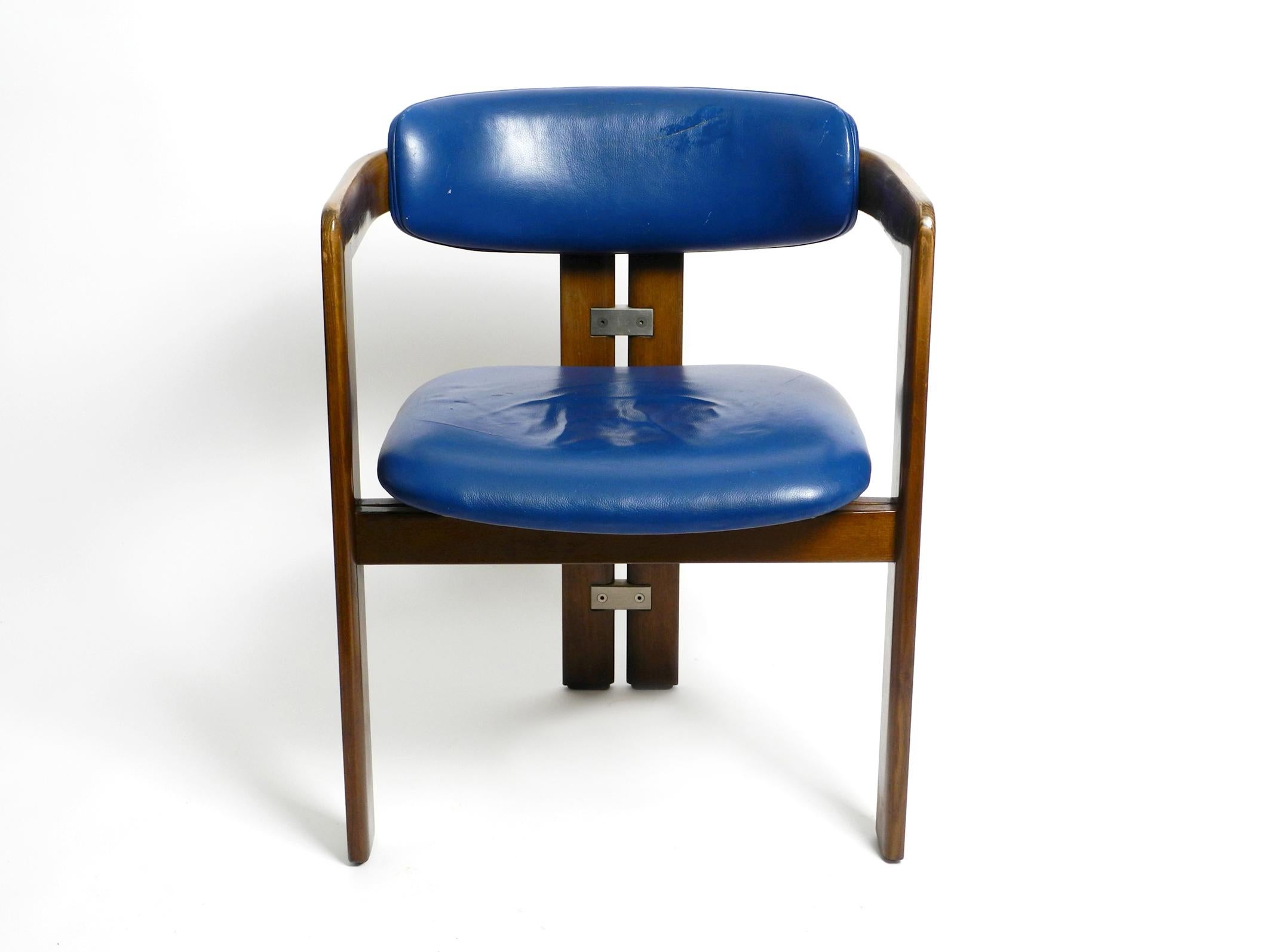 One Pamplona chair by Augusto Savini for Pozzi in rare original blue leather upholstery and solid beech wood. Designed in Italy 1965.
Dark stained beech wood frame. This chair with it's original leather upholstery is from the 1970s.
100% Original
