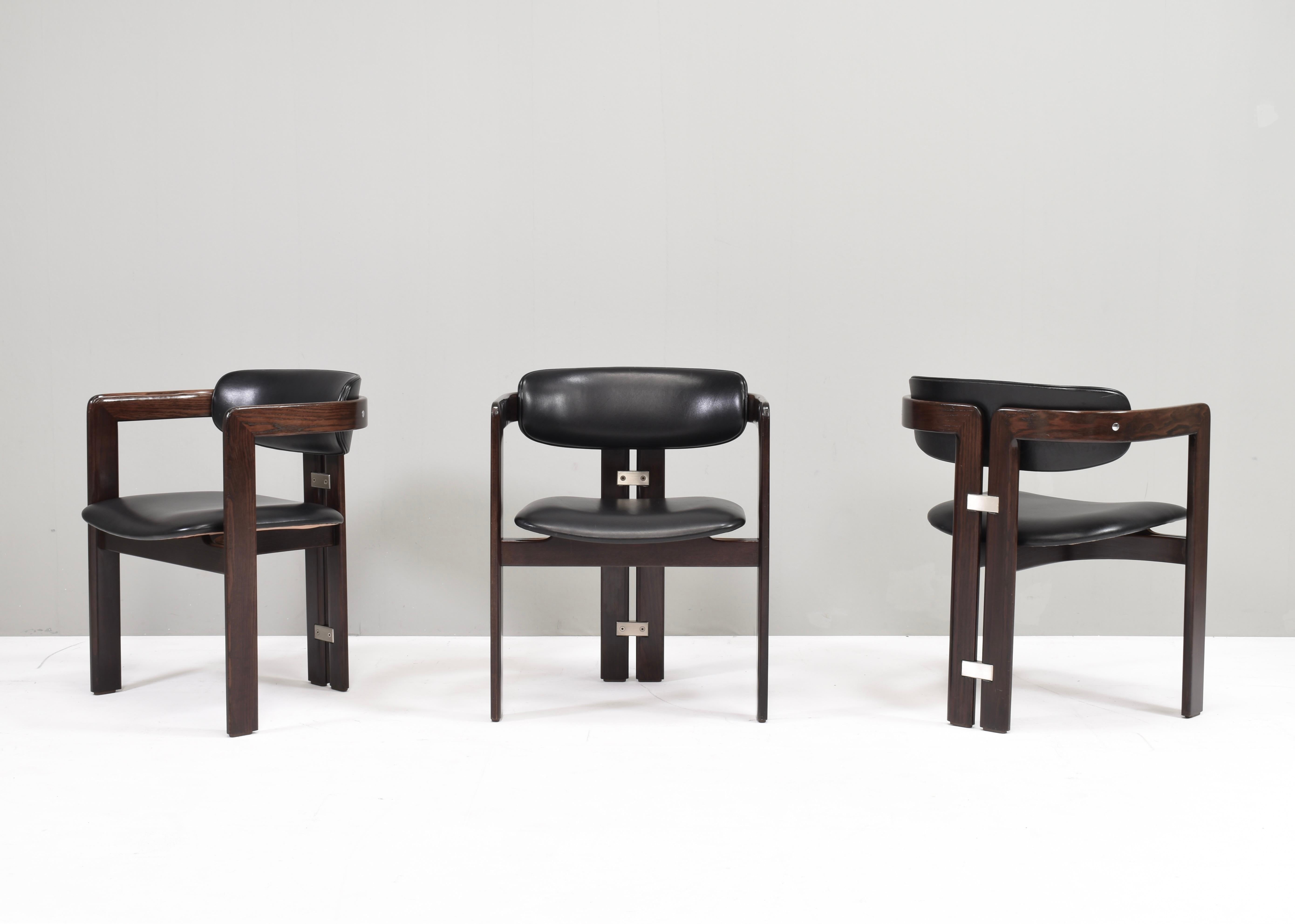 Introducing Pozzi's Pamplona Chairs by Augusto Savini - Italy, 1965.

The chairs represent a harmonious blend of Italian design flair, craftsmanship, and comfort. Augusto Savini, a renowned designer, is celebrated for his ability to infuse elegance