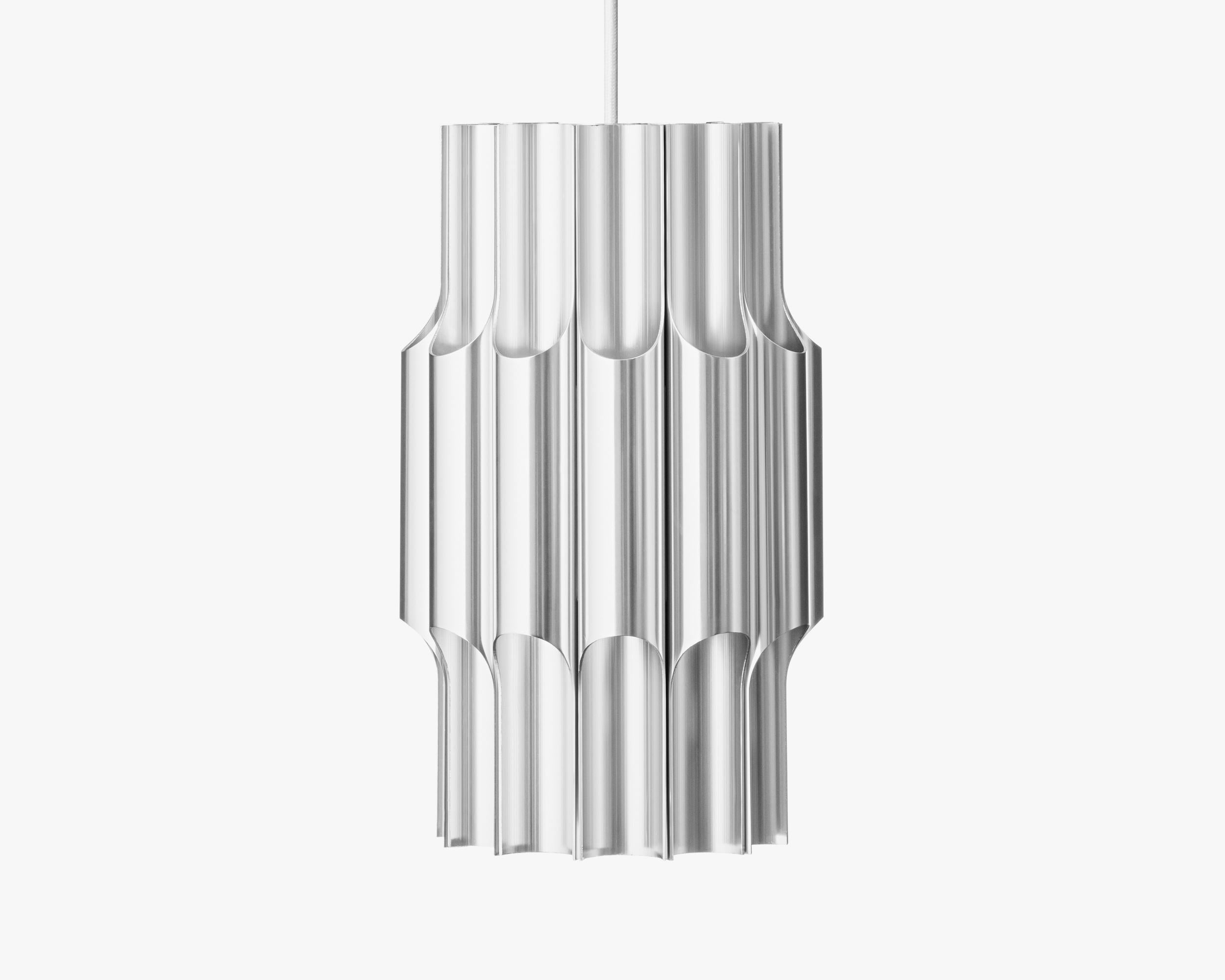Pendant lamp PAN / 300 by Lyfa
Pendant lamp Pan signed by Bent Karlby for Lyfa

Aluminum
D.300mm H.480mm
Steel wire (white textile) 6m
Bulb: E27 max 60W (120-230V)


PAN is a visually striking piece designed by Bent Karlby in 1970, combining light