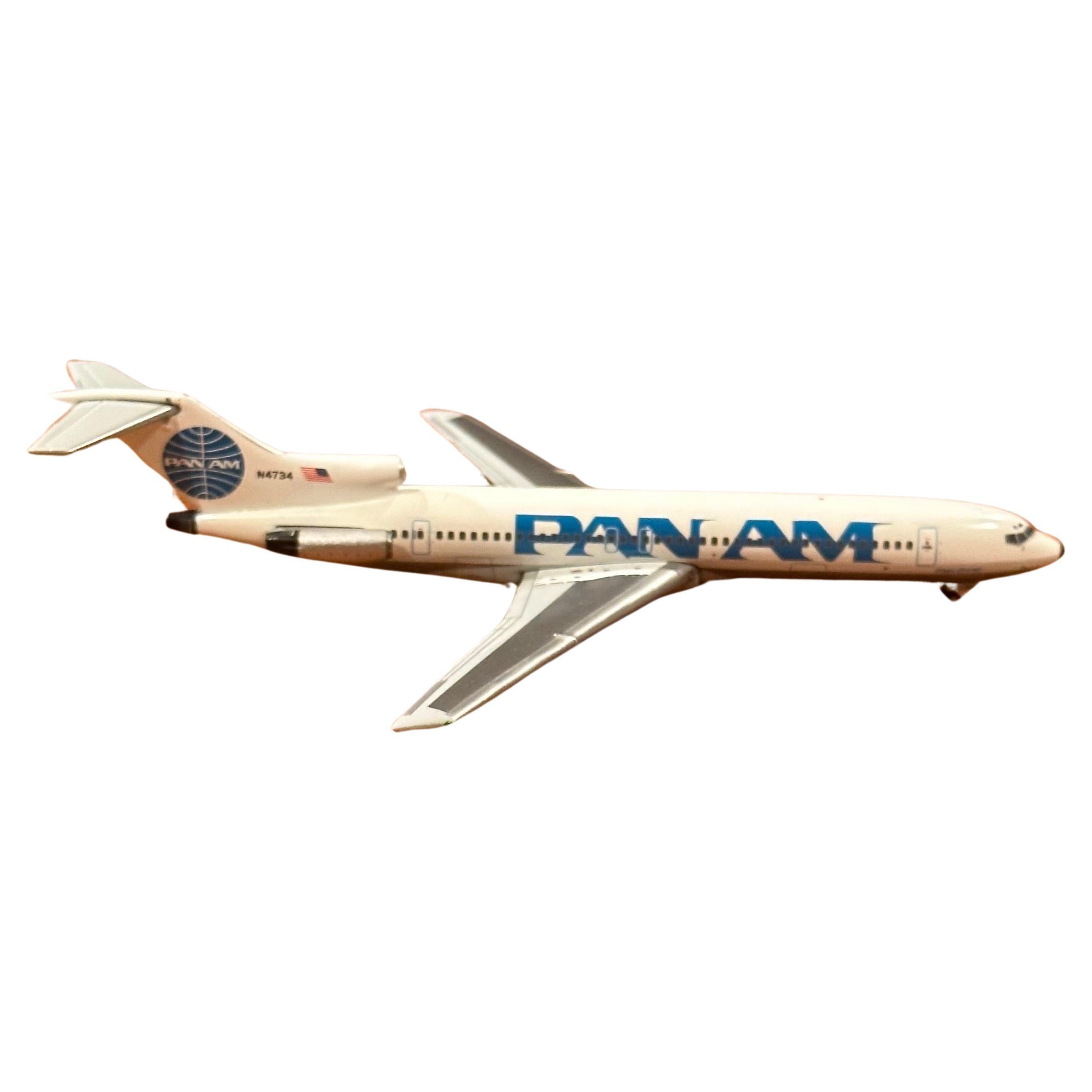 A very cool Pan American Airlines jetliner / airplane die cast paperweight / mini model, circa 1990s.  The model is in very good condition and measures 745