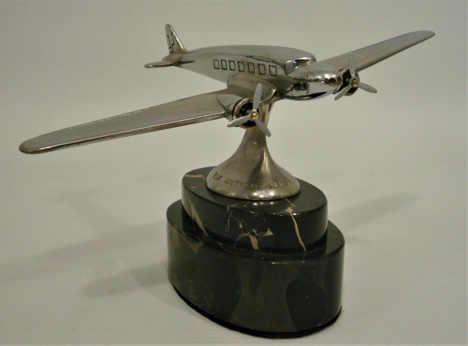 Pan American - Grace Airways Airplane Model Advertising Paperweight. 
circa 1930´s.

Pan American-Grace Airways, also known as Panagra, and dubbed 