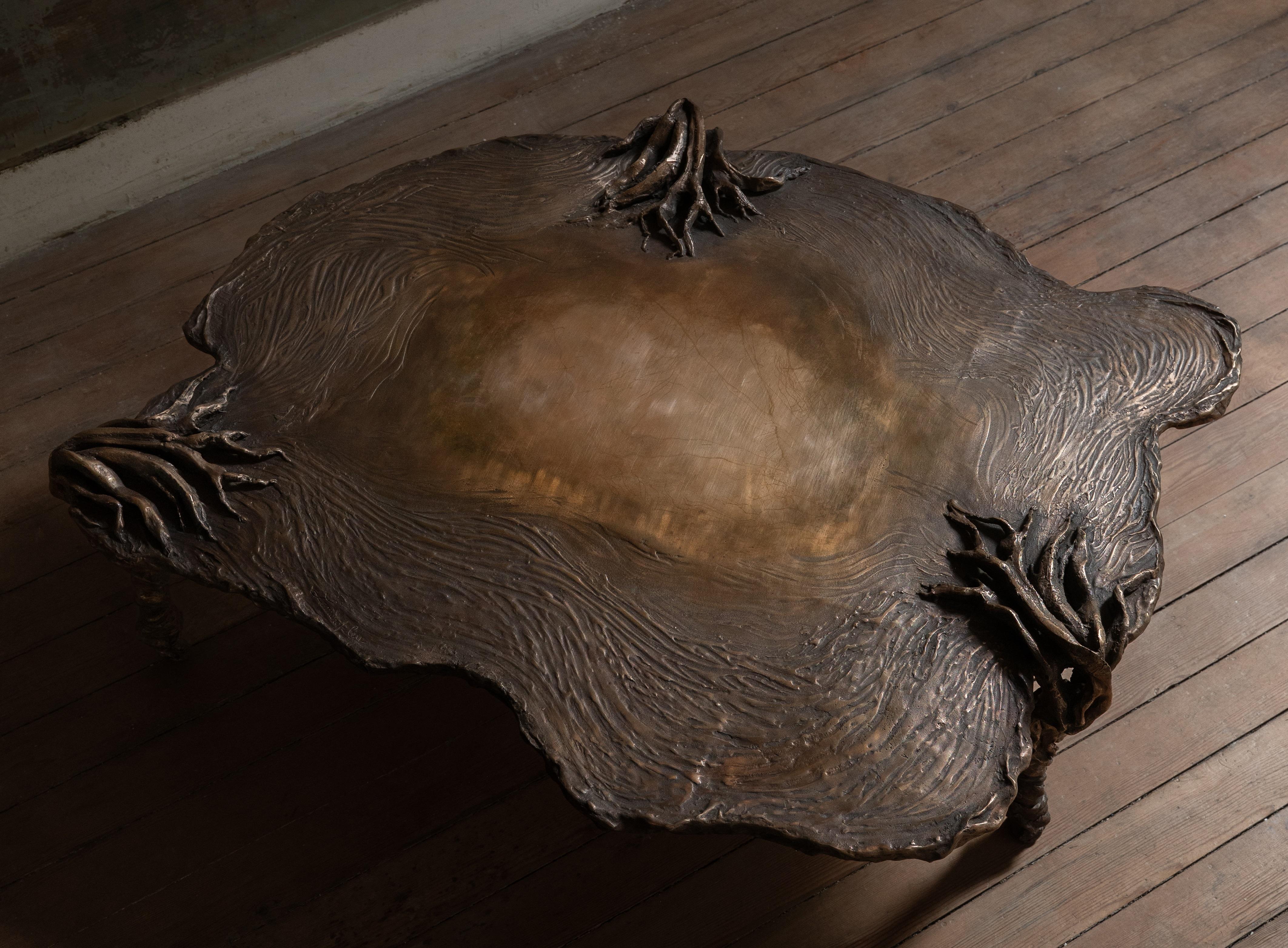 Pan Bronze Low Decorative Contemporary Coffee Table by Emilie Lemardeley
Limited Edition of 8 Pieces.
Dimensions: Ø 120 x H 40 cm.
Materials: Bronze.

Designed as jewellery for the interior, the Lemardeley’s creations reflect French craftsmanship