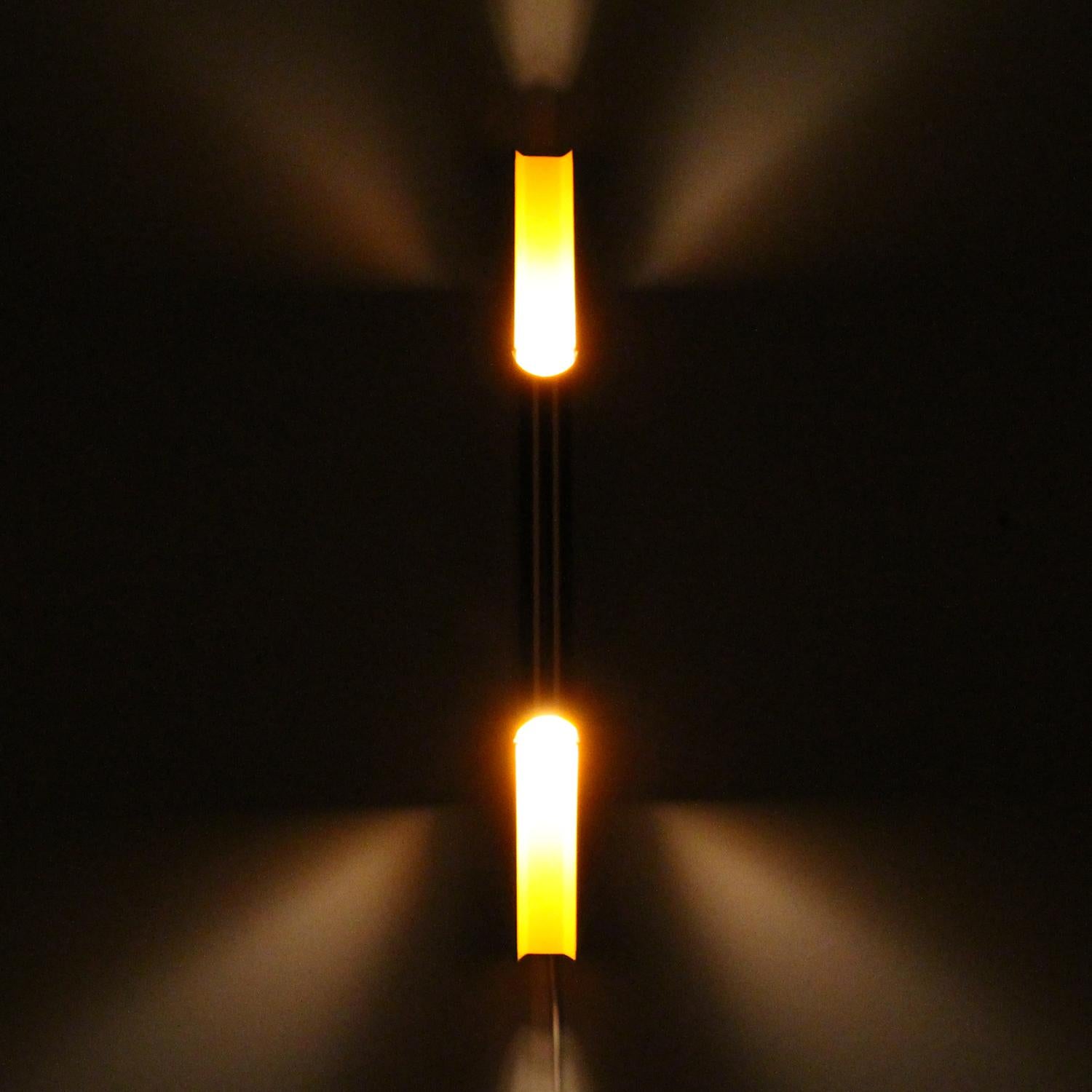 Pan-Opticon - an elegant Danish modern sconce designed by Bent Karlby in 1968-1969 and produced by LYFA - aluminum wall lamp with yellow inner in excellent vintage condition.

The Pan-Opticon is made up of a long narrow aluminum 'pan-flute' piece