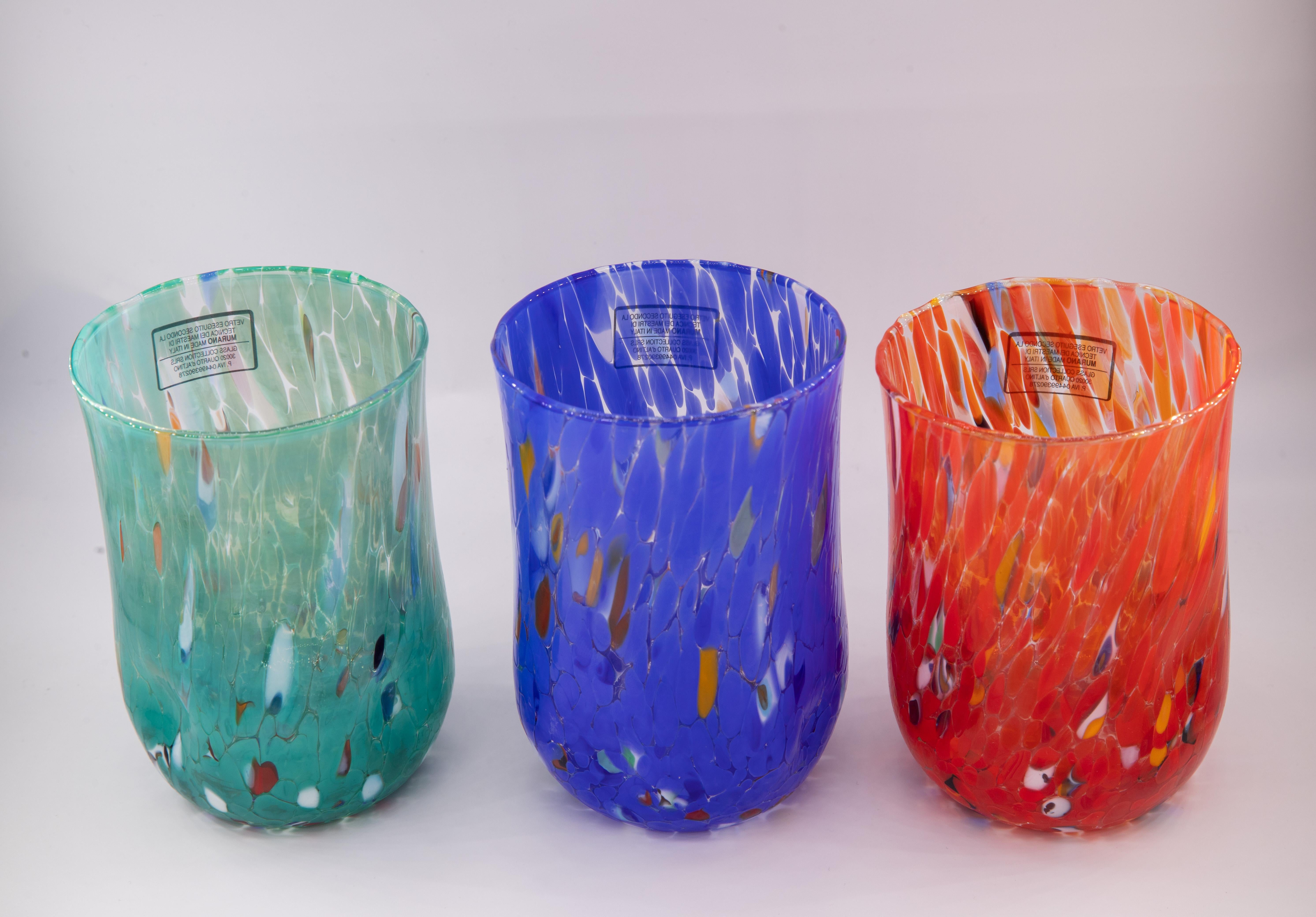 Set of six water\drink\wine glasses color Multicolor (petrol green, blue, red, ivory, periwinkle, mustard) - Murano glass - Made in Italy.

These individual Murano glasses are inspired by the classic 