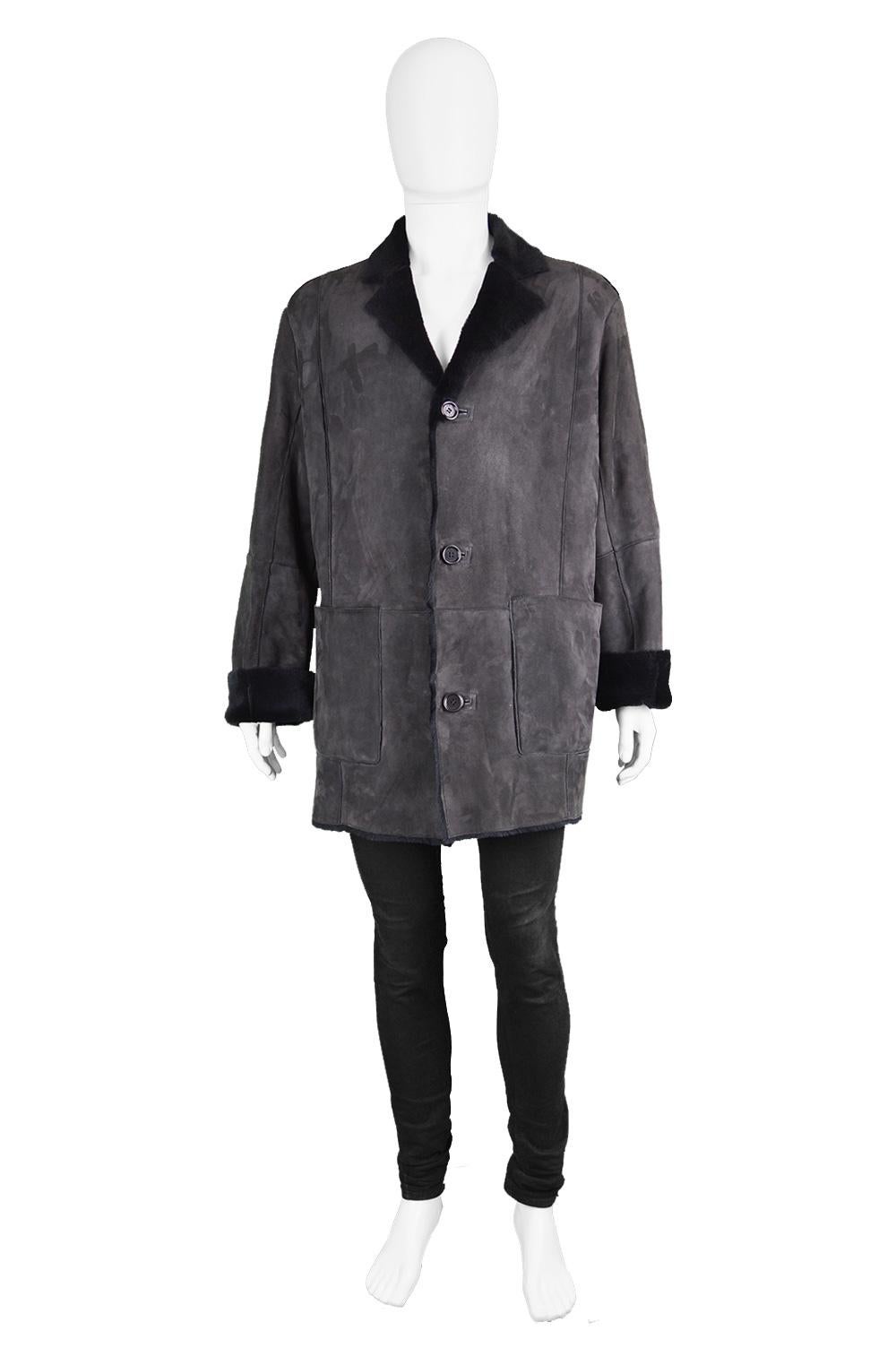 A luxury men's vintage black sheepskin ovine suede and fur vintage overcoat by Pancaldi & B from the 1990s. 

Click 'CONTINUE READING' below for Size & Description.

Size: Marked 52 which is roughly a men's Large to XL. Please check