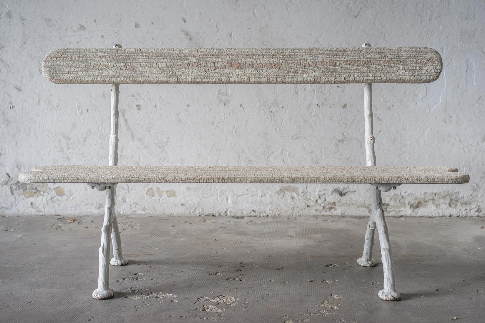 Panchina Bianca Antique bench by Yukiko Nagai.
Dimensions: D55 x W157 x H90 cm.
Material: Iron , Marble, Natural stone, Cement, Stucco
Weight: 80 kg. 

A vintage white bench, made out of iron and wood, has been used as the subject for a new