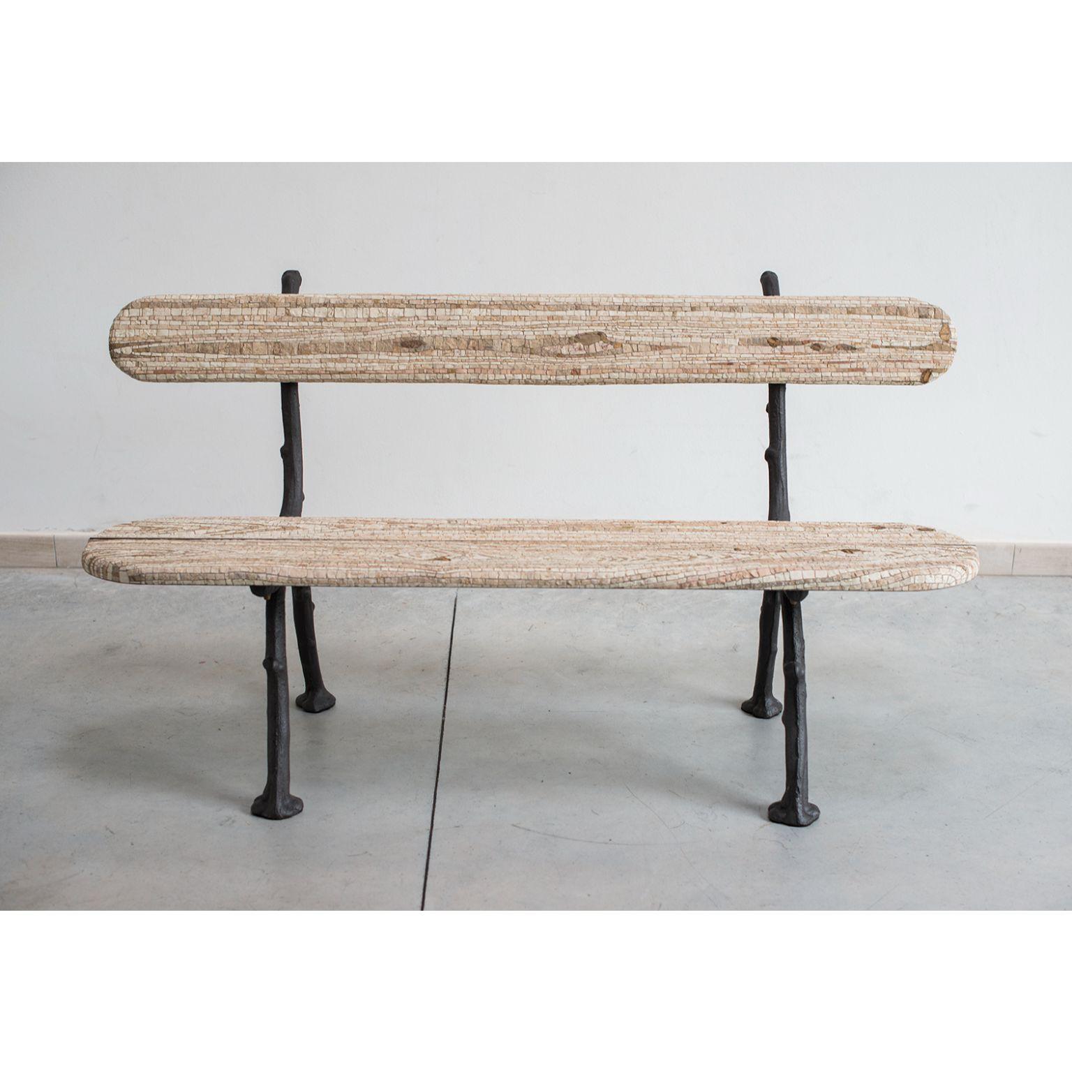 Panchina camel Antique bench by Yukiko Nagai
Dimensions: D55 x W152 x H85 cm
Material: Iron, Marble, Natural stone, Cement, Stucco
Weight: 60 kg 

An old vintage bench made of iron and wood has been used as a subject for a new mosaic bench with