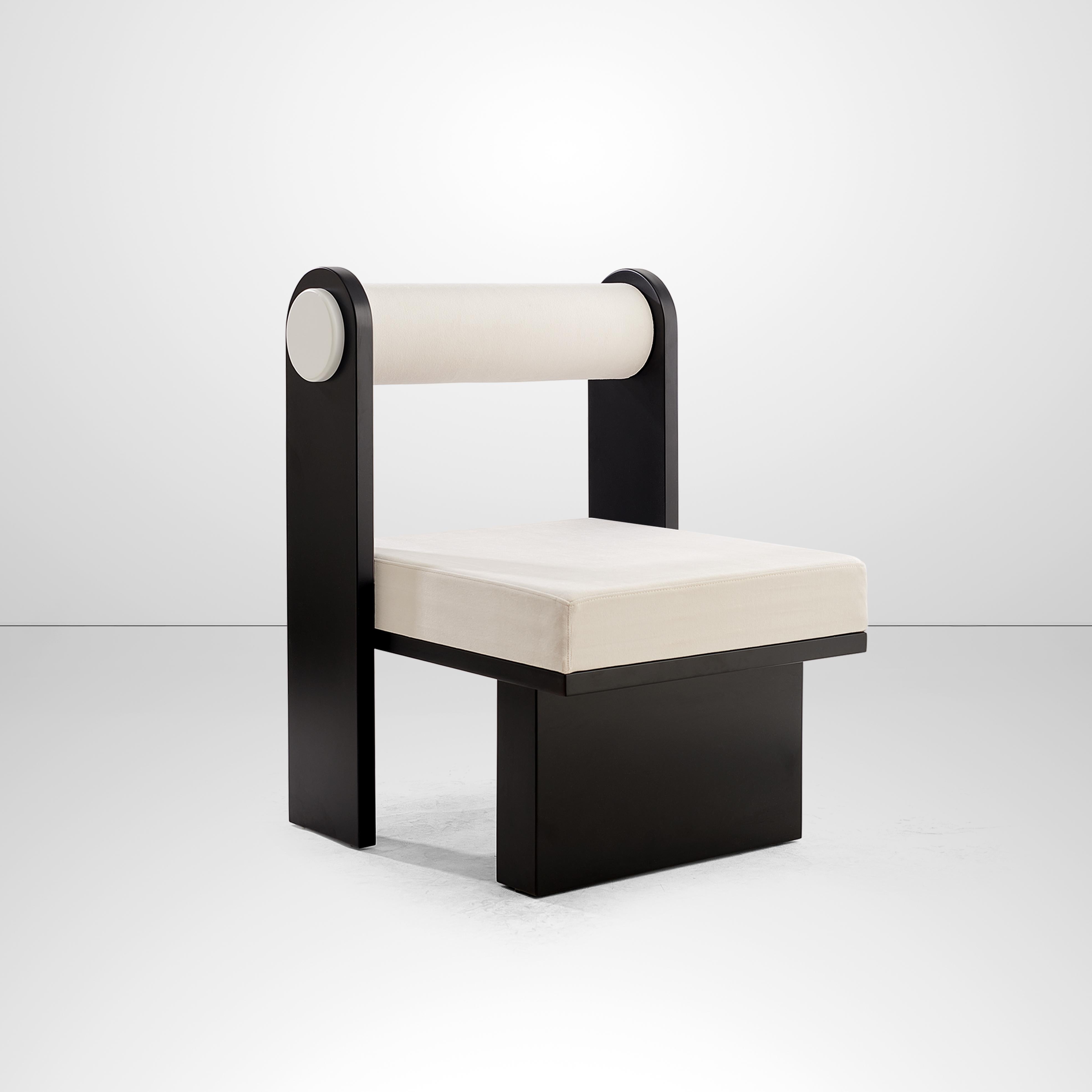 Panda lounge chair by Melis Tatlicibasi 
Materials: White velvet upholstery, laquered natural oak
Dimensions: W 55 x D 65 x H 85 cm

The Panda collection is a minimalist work with some far eastern touches. Inspired by the shy and playful