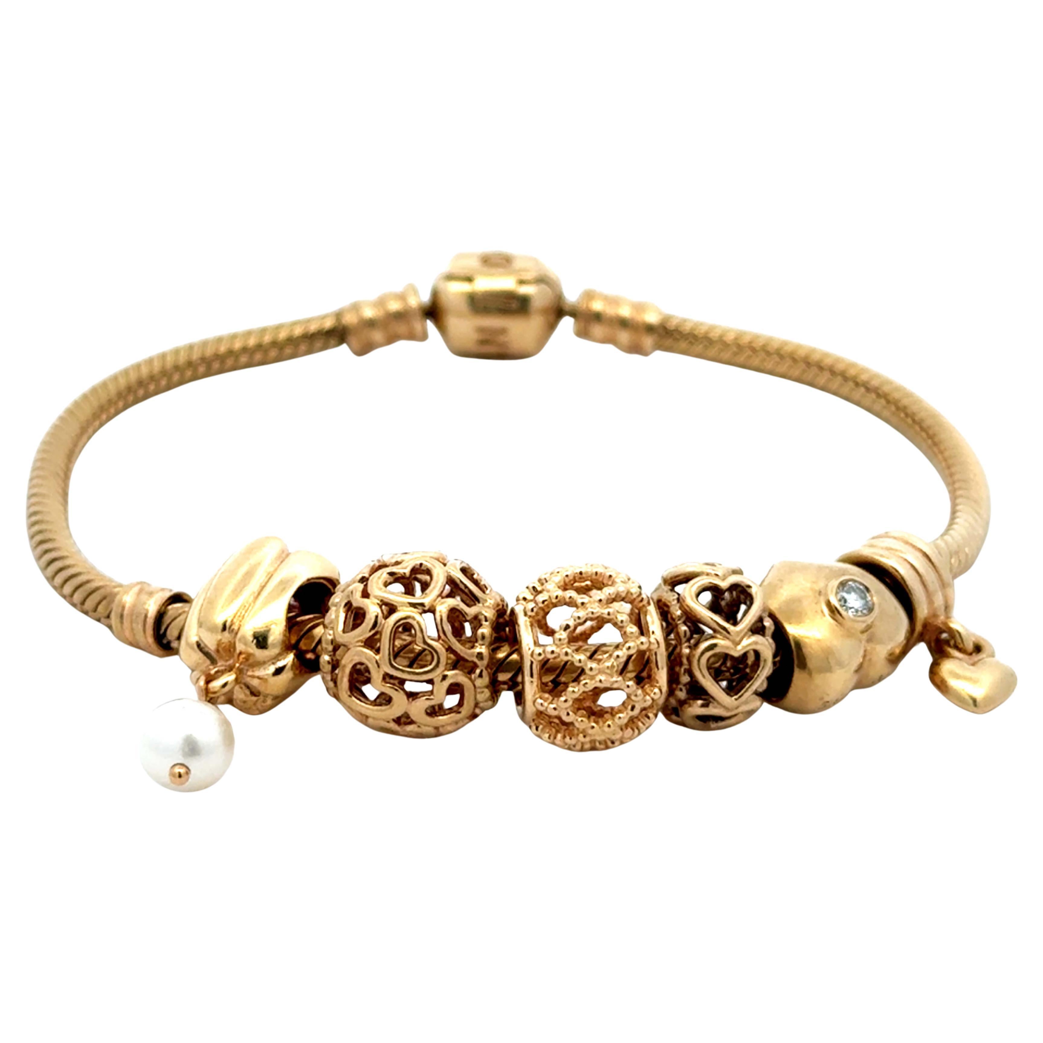 Pandora Herzarmband aus 14 Karat massivem Gelbgold mit 6 Charm-Diamanten