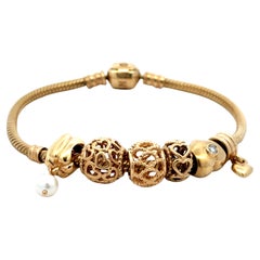 Pandora Herzarmband aus 14 Karat massivem Gelbgold mit 6 Charm-Diamanten